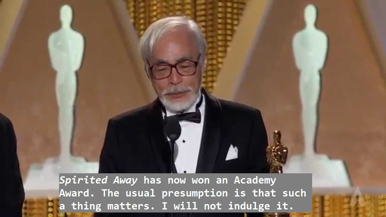 Miyazaki accepting an Oscar. The subtitle reads "Spirited Away has now won an Academy Award. The usual presumption is that such a thing matters. I will not indulge it."