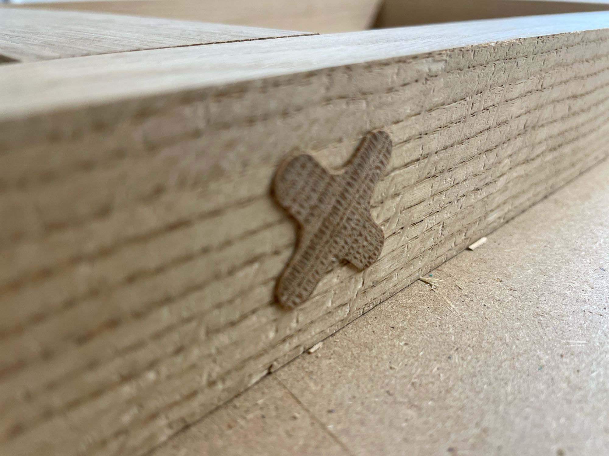 A cross shaped oak tenon.