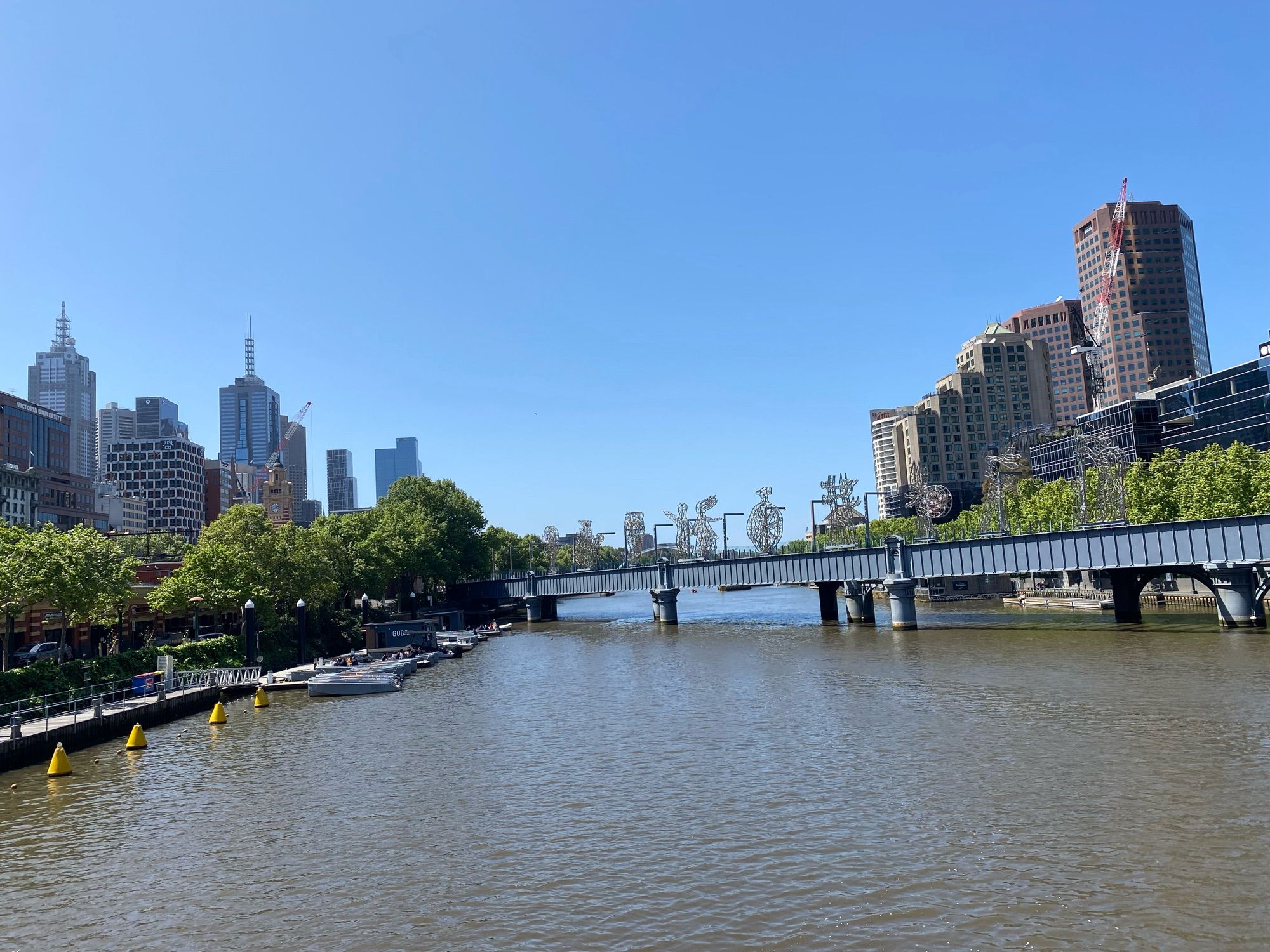 Melbourne CBD crossing the Yarra river blue sky lovely day