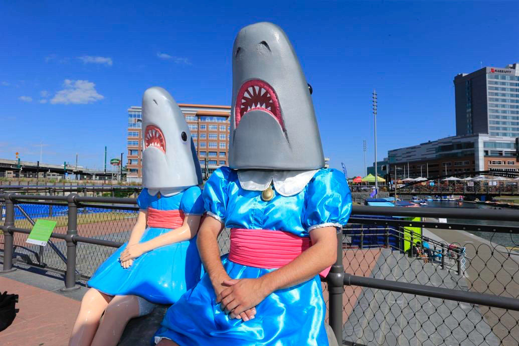 A guy dressed as the Shark Girl statue in Buffalo.