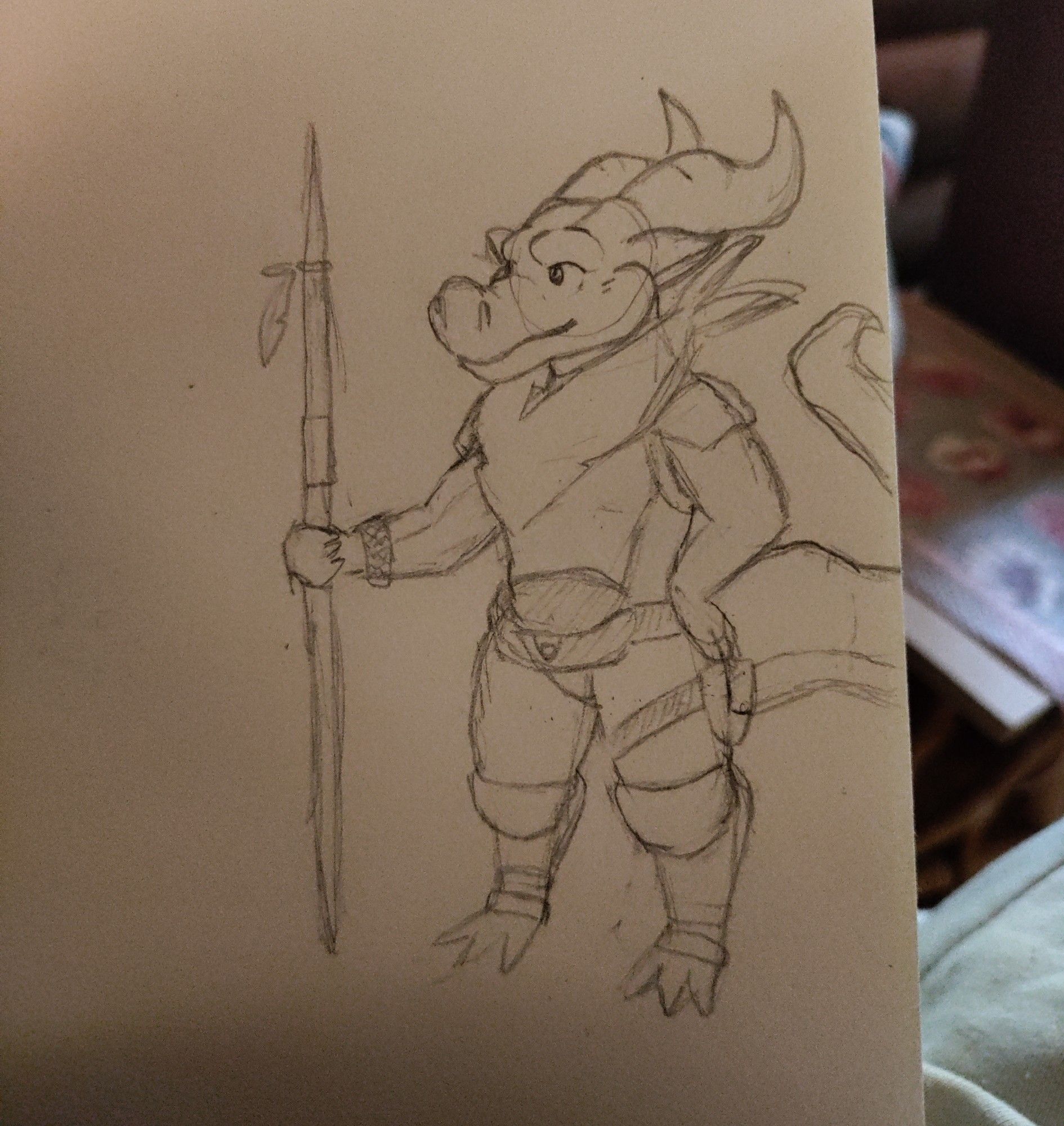 an sketch on a paper of a kobold with a toothpick weapon, and armor and other gear.