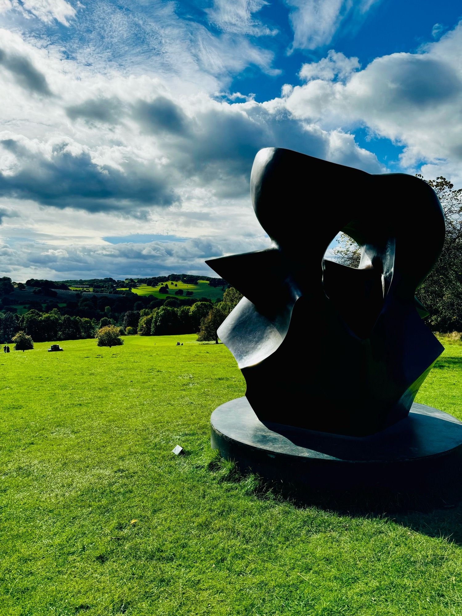 A photograph of Henry Moore’s Large Spindle Piece, at Yorkshire Sculpture Park.