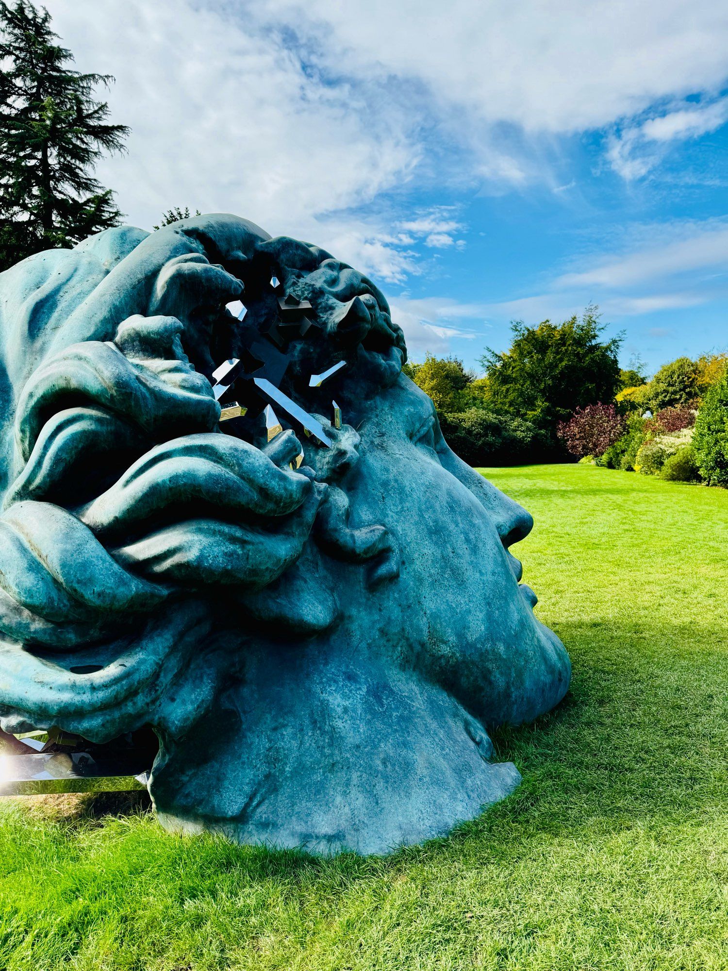 Photograph of Daniel Arsham’s Unearthed Bronze Eroded Melpomene, taken at the Yorkshire Sculpture Park.