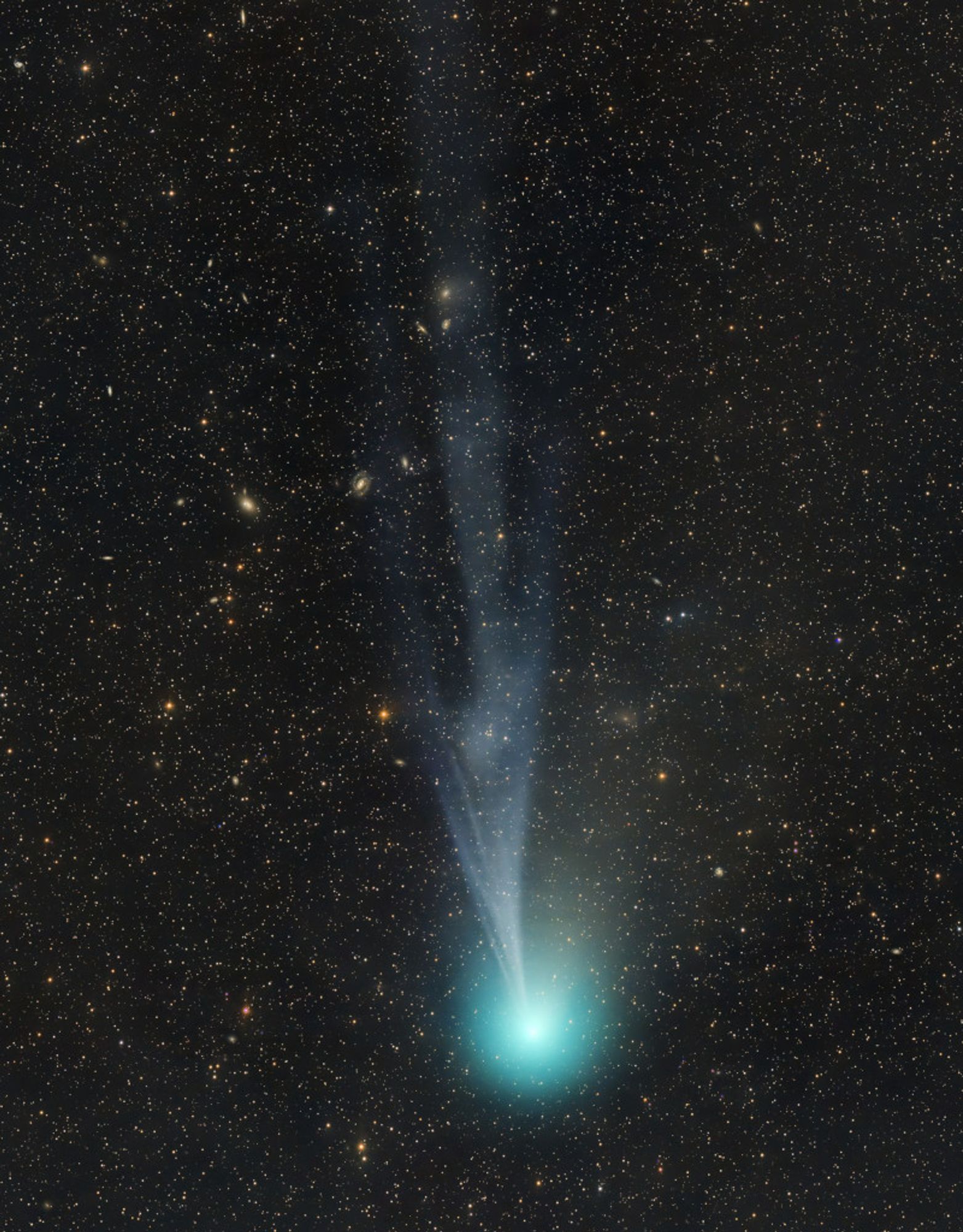 Heading for its next perihelion passage on April 21, Comet 12P/Pons-Brooks is growing brighter. The greenish coma of this periodic Halley-type comet has become relatively easy to observe in small telescopes. But the bluish ion tail now streaming from the active comet's coma and buffeted by the solar wind, is faint and difficult to follow. Still, in this image stacked exposures made on the night of February 11 reveal the fainter tail's detailed structures. The frame spans over two degrees across a background of faint stars and background galaxies toward the northern constellation Lacerta. Of course Comet 12P's April 21 perihelion passage will be only two weeks after the April 8 total solar eclipse, putting the comet in planet Earth's sky along with a totally eclipsed Sun.