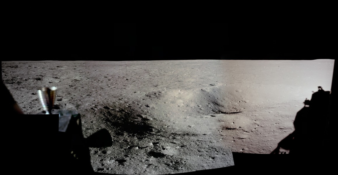 Have you seen a panorama from another world lately? Assembled from high-resolution scans of the original film frames, this one sweeps across the magnificent desolation of the Apollo 11 landing site on the Moon's Sea of Tranquility. The images were taken 55 years ago by Neil Armstrong looking out his window on the Eagle Lunar Module shortly after the July 20, 1969 landing. The frame at the far left (AS11-37-5449) is the first picture taken by a person on another world. Thruster nozzles can be seen in the foreground on the left (toward the south), while at the right (west), the shadow of the Eagle is visible. For scale, the large, shallow crater on the right has a diameter of about 12 meters. Frames taken from the Lunar Module windows about an hour and a half after landing, before walking on the lunar surface, were intended to document the landing site in case an early departure was necessary.