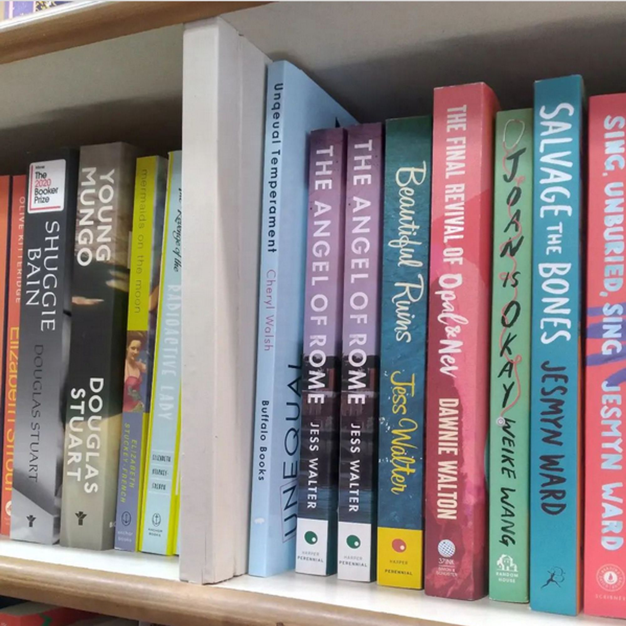 Unequal Temperament by Cheryl Walsh on a bookstore shelf next to Jess Walter's The Angel of Rome.