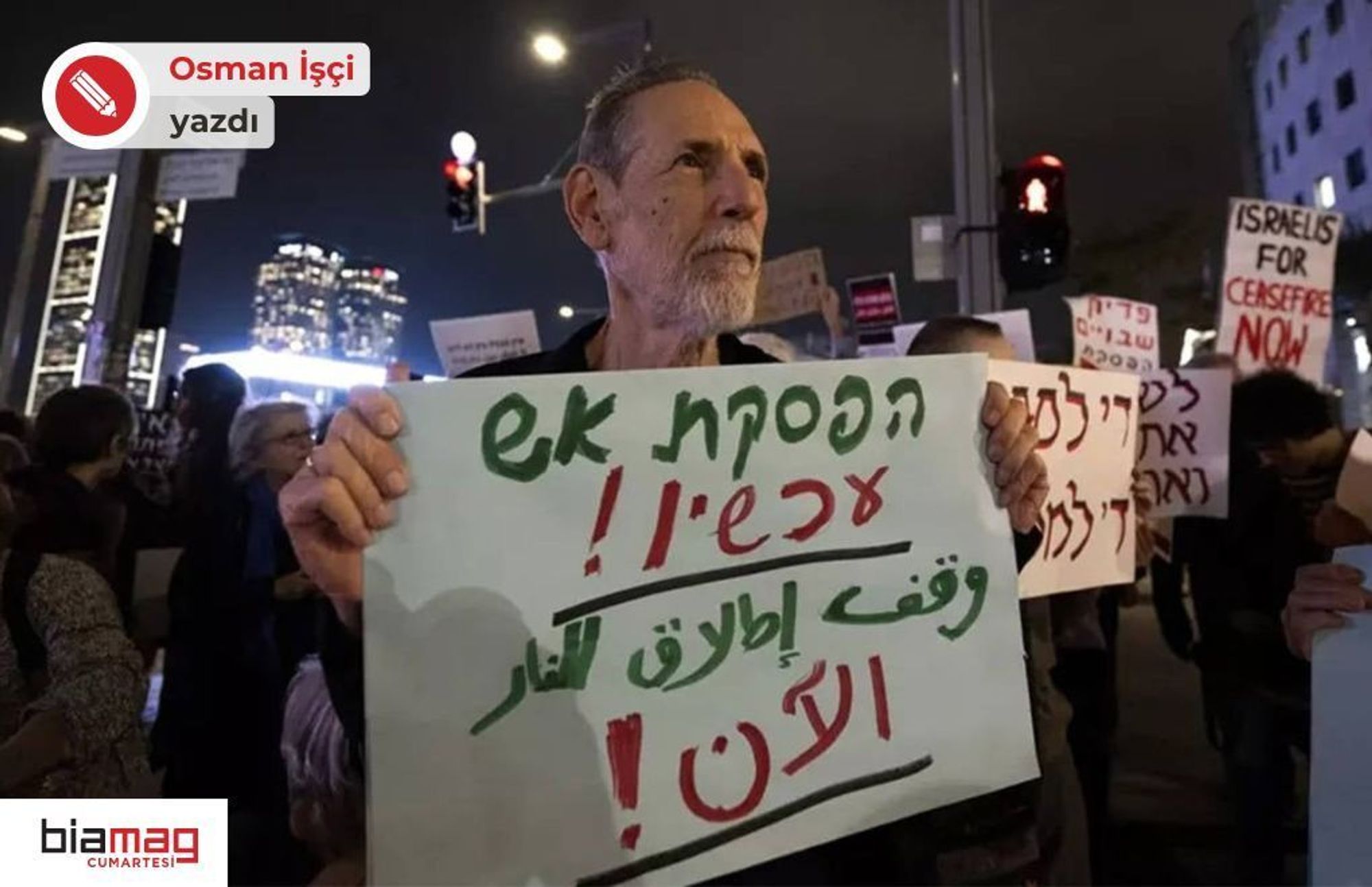 *Tel Aviv'de savaş karşıtı protesto, 5 Aralık 2023. Dövizde, Arapça ve İbranice "Ateşkes, şimdi!" yazıyor. (Fotoğraf: AA)