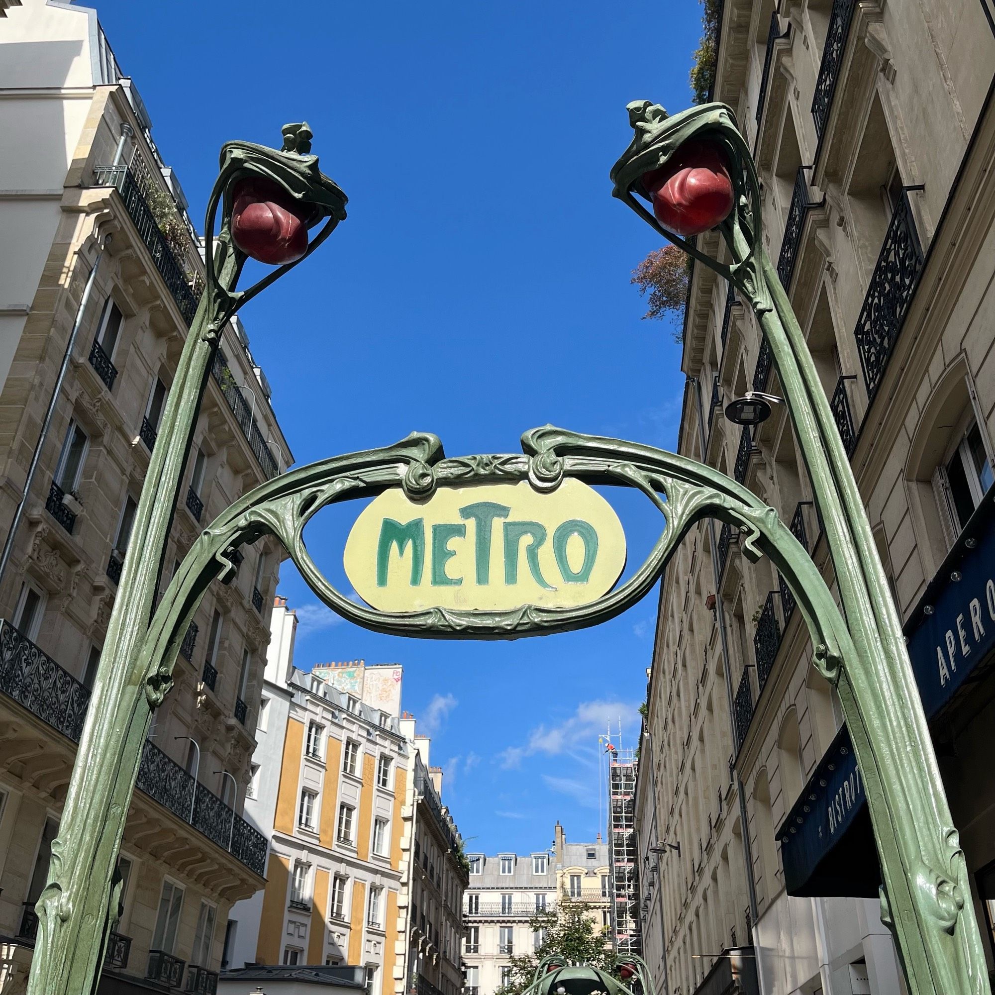 The art nouveau entrance of a Paris metro station