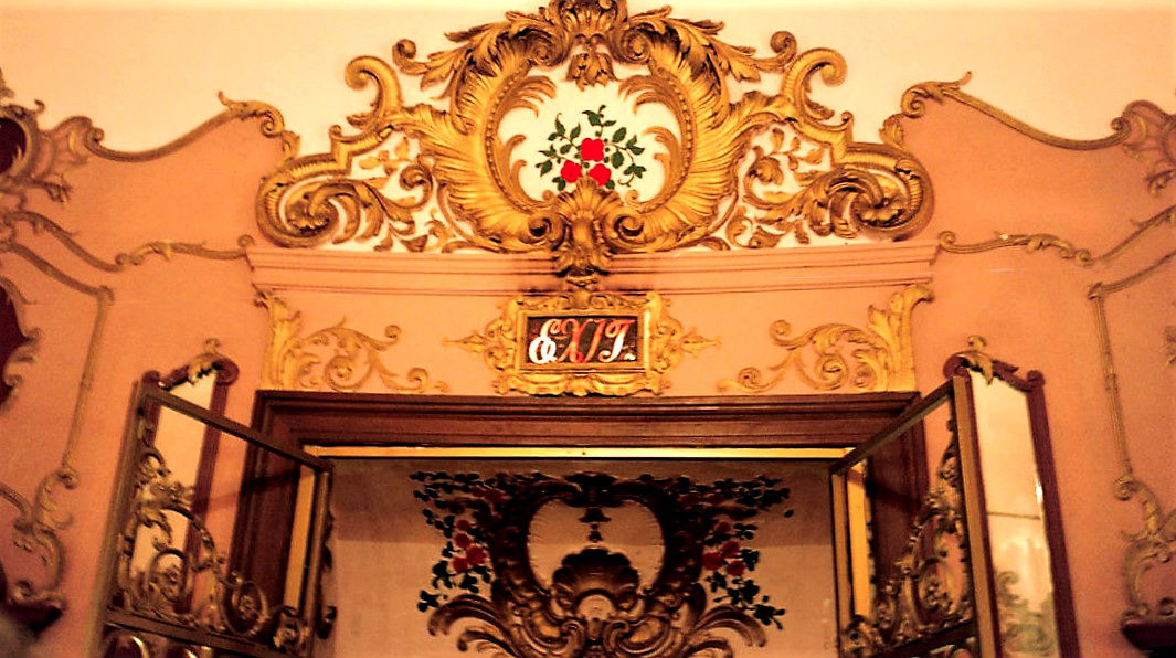 an exit sign in the ladies cosmetics room at the Los Angeles theatre