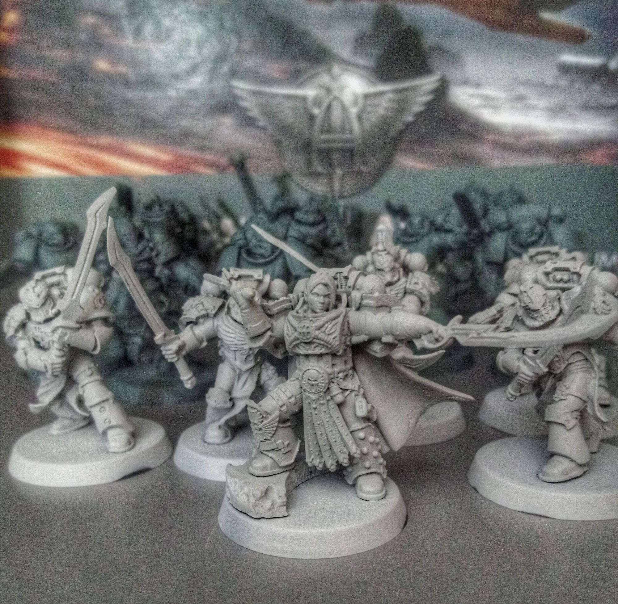 Miniatures of Squad Nasicae and Lucius pre-Heresy. They are primed light grey.