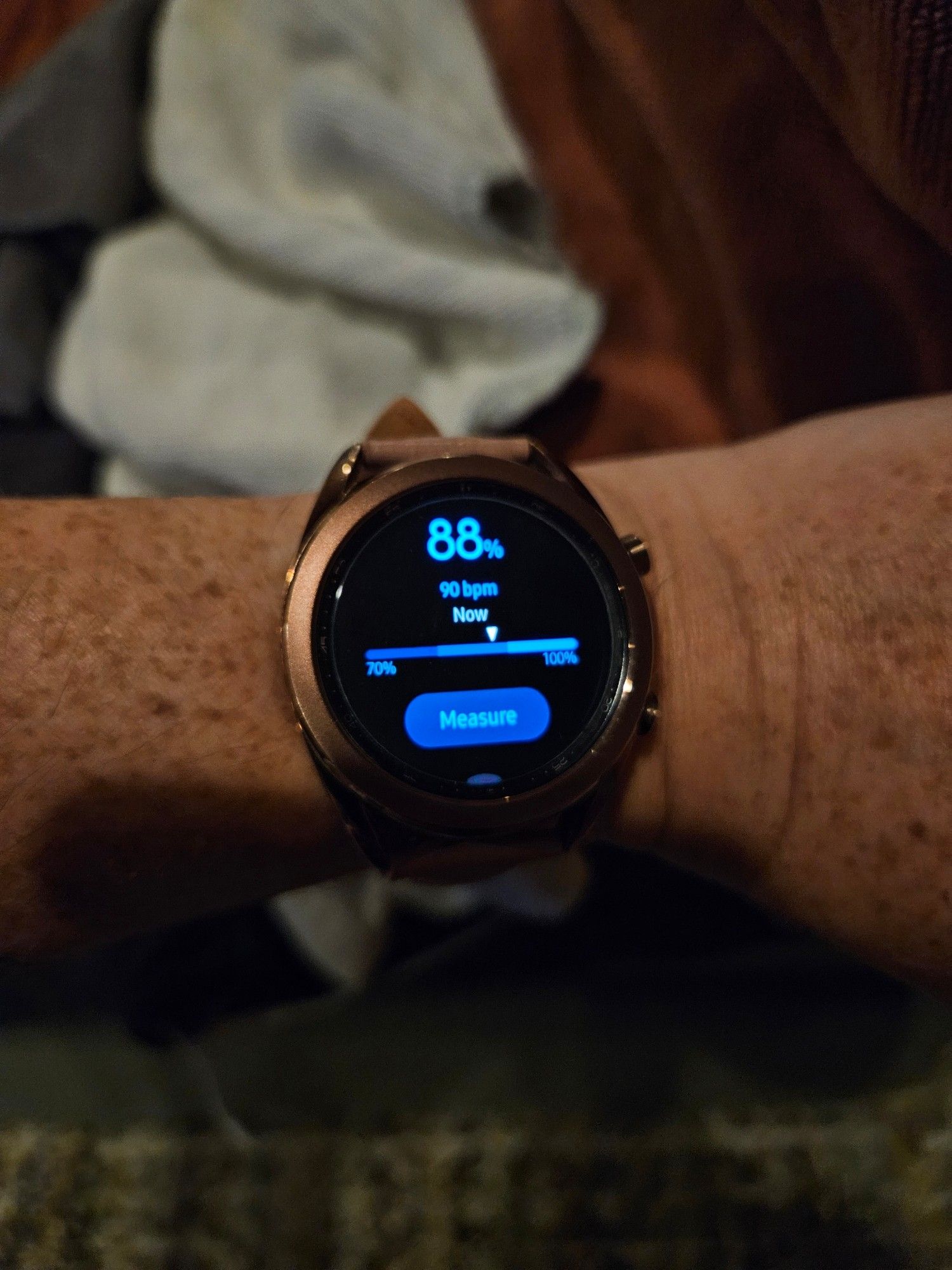 Samsung Watch on wrist with pulse oximetry display showing 88% oxygen saturation