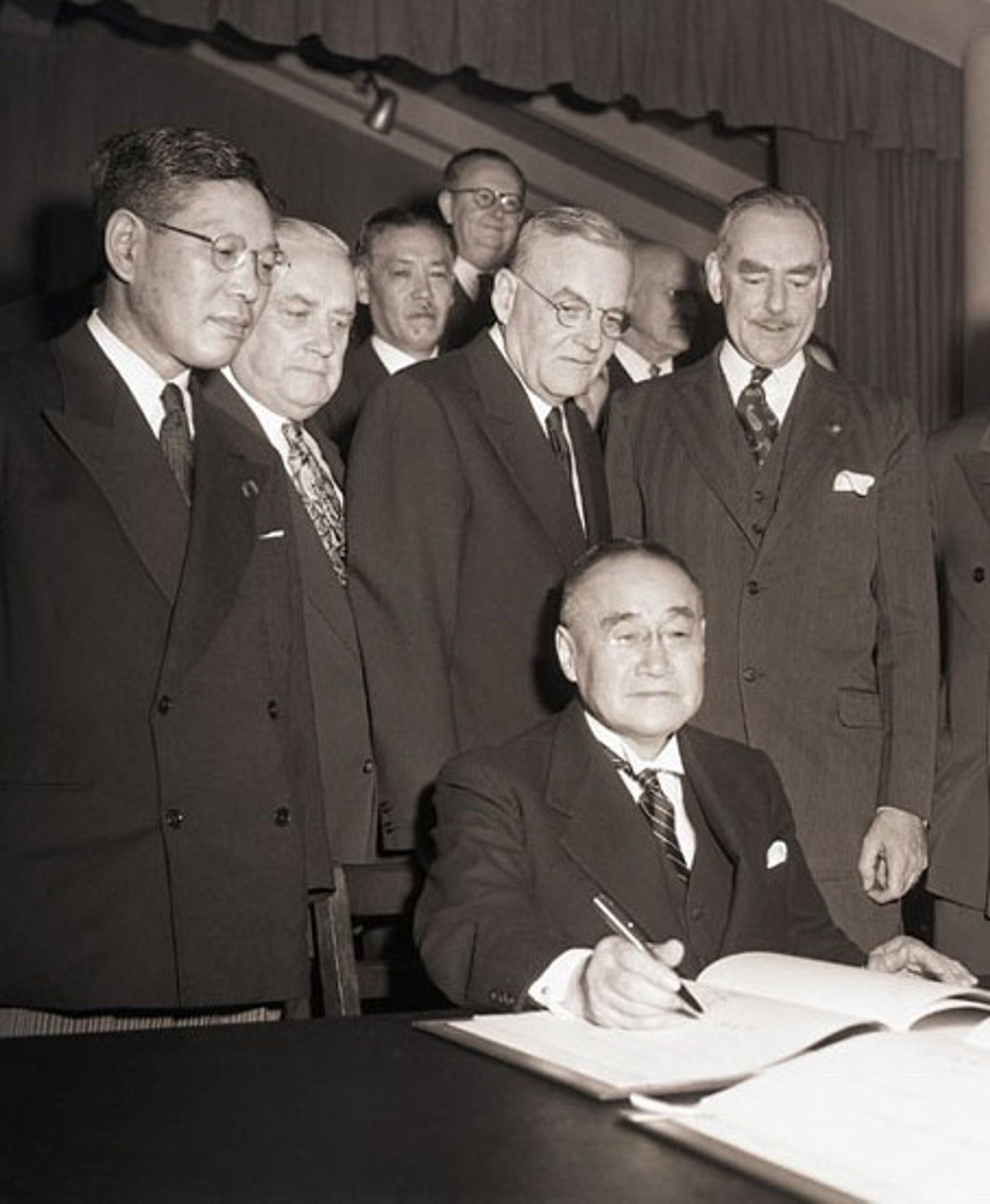 Prime Minister Yoshida Shigeru signs the bilateral security treaty with the United States on September 8, 1951.