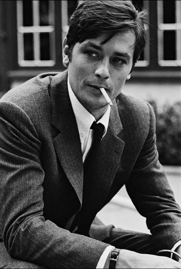 Black & white photo of a young Alain Delon.