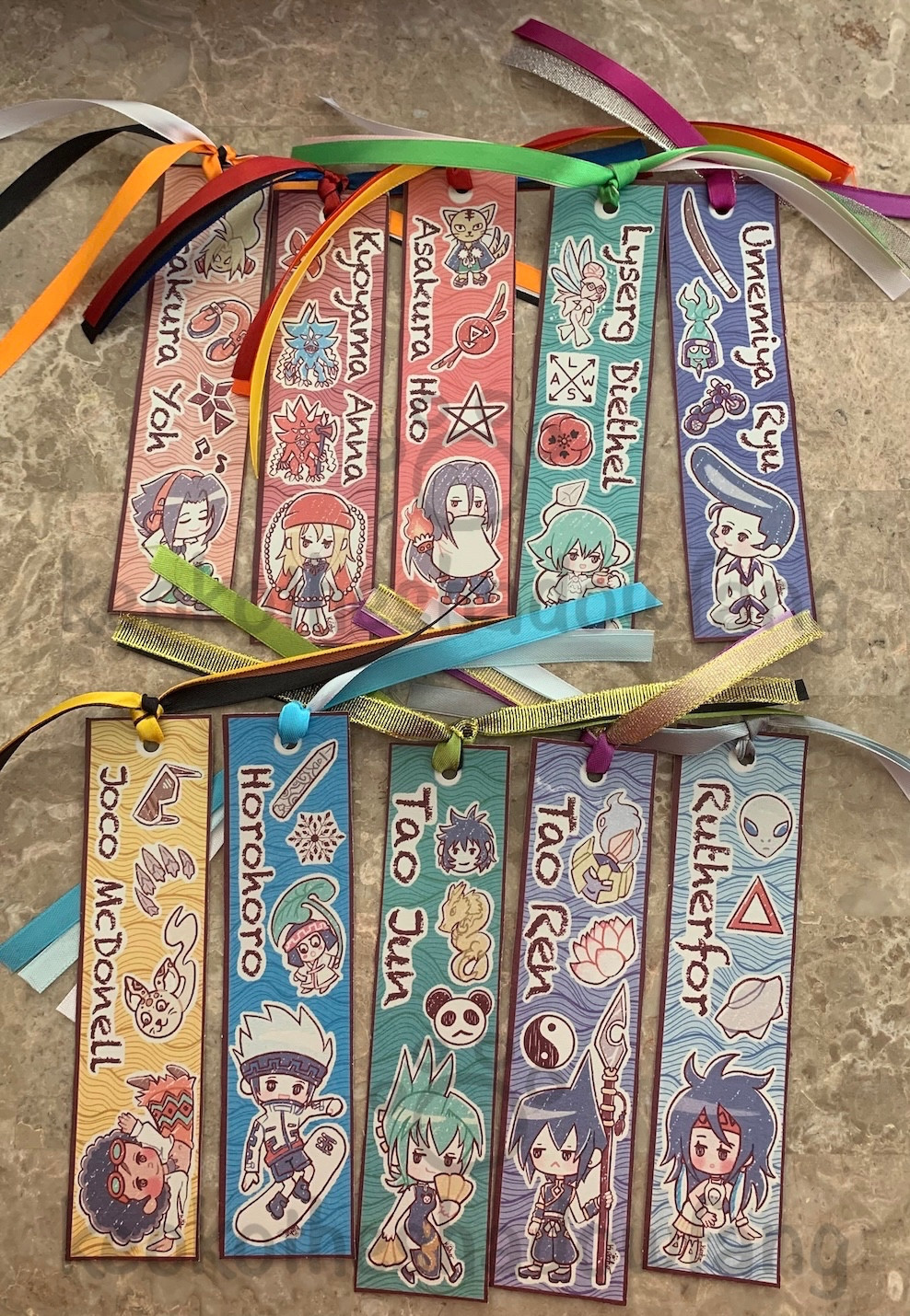 A set of 10 Shaman King bookmarks. With the characters Yoh, Anna, Hao, Lyserg, Ryu, Joco, Horo, Jun, Ren and Rutherford and three things that are important to them!