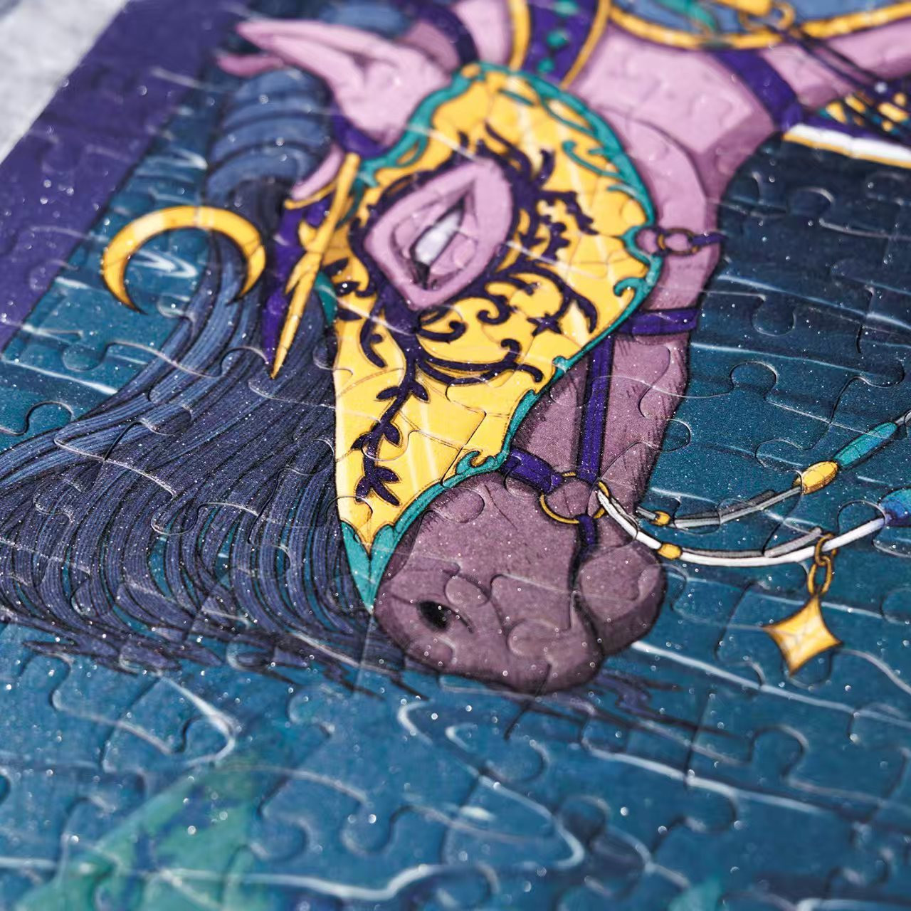 A close-up of the puzzle with the focus on the horse's face from my illustration Star Collector