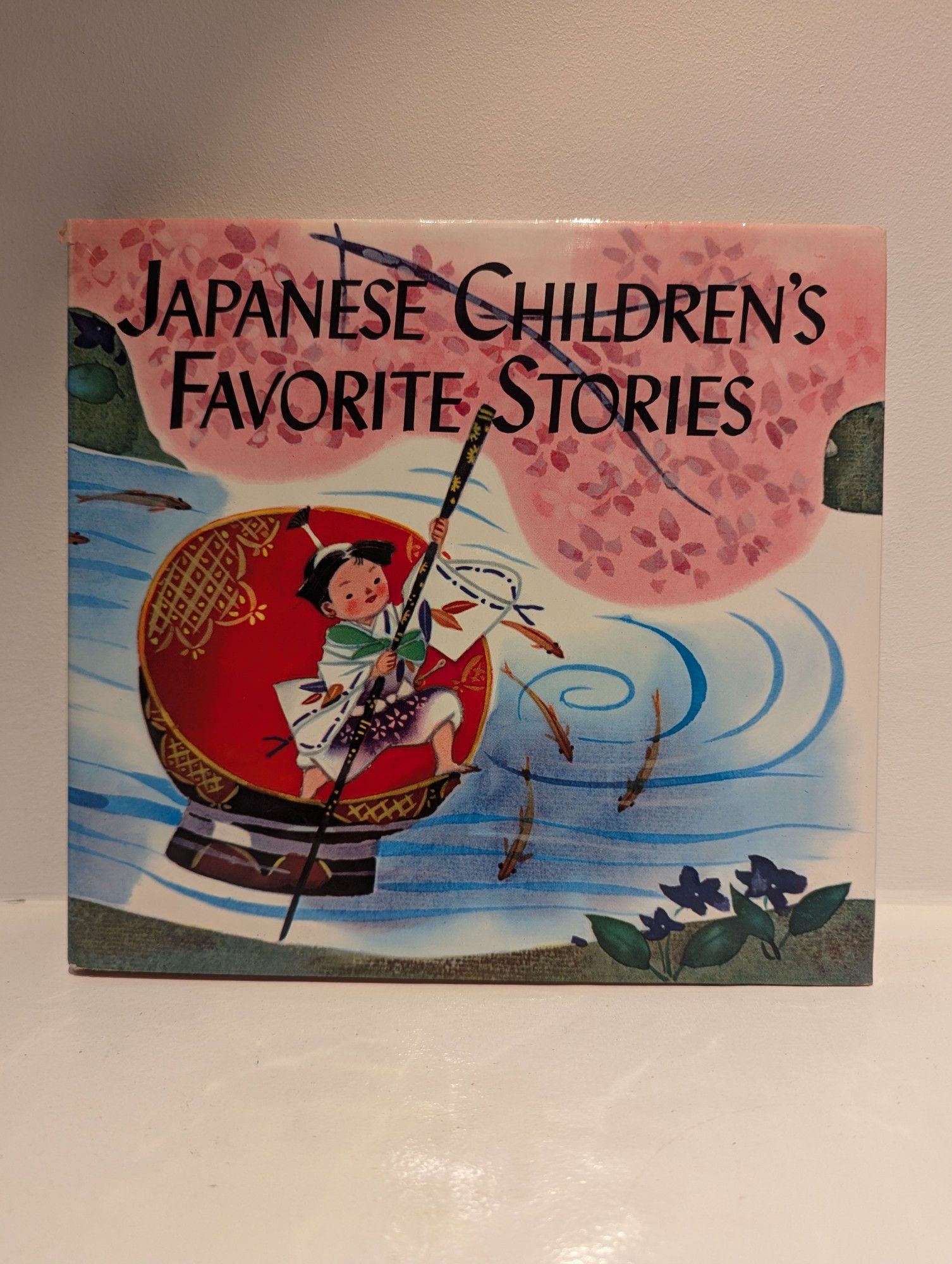 A copy of "Japanese Children's Favorite Stories" a collection of folktales and fables