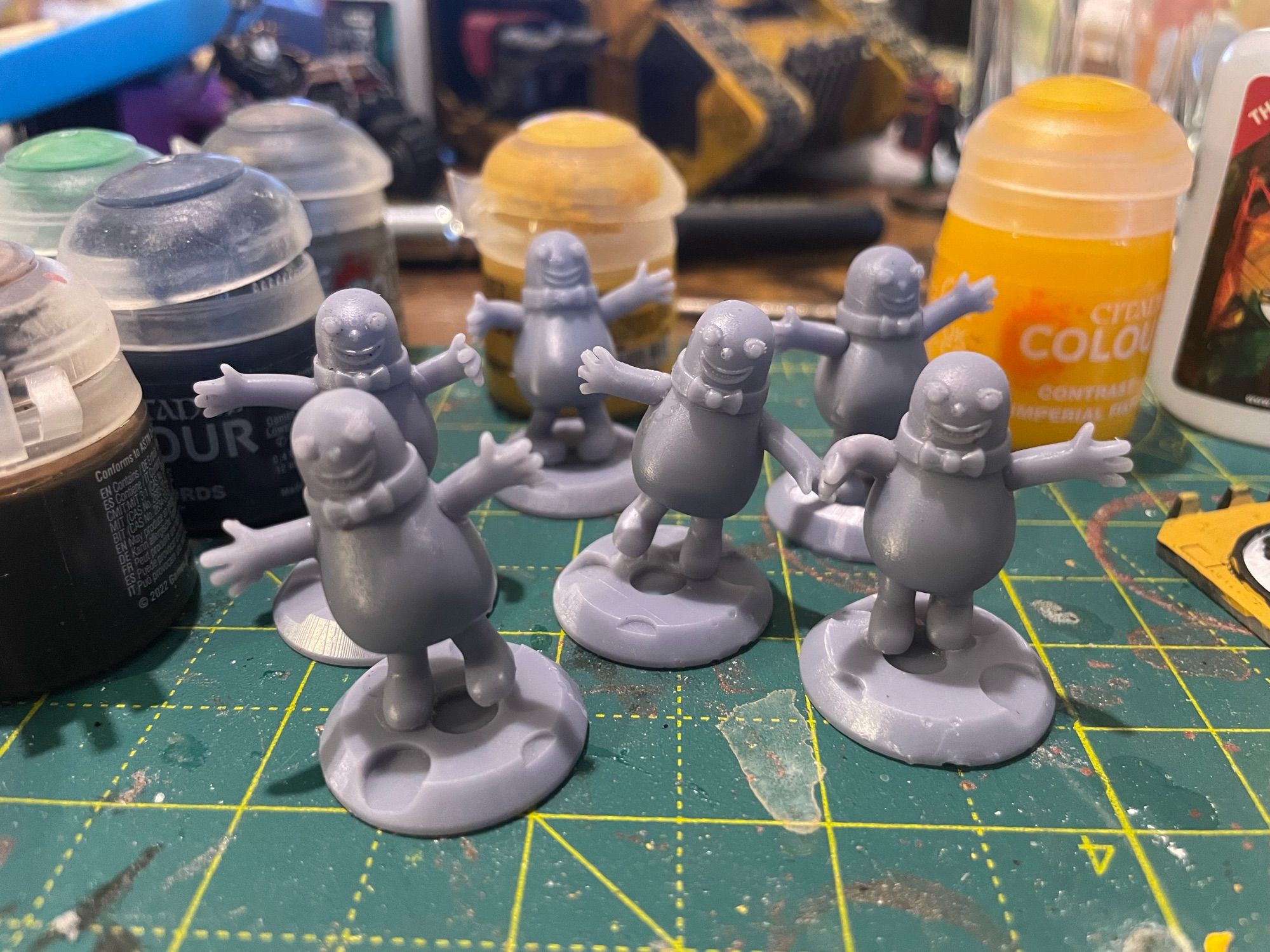 Fully assembled but unpainted little Mr Blobbies (six of them)