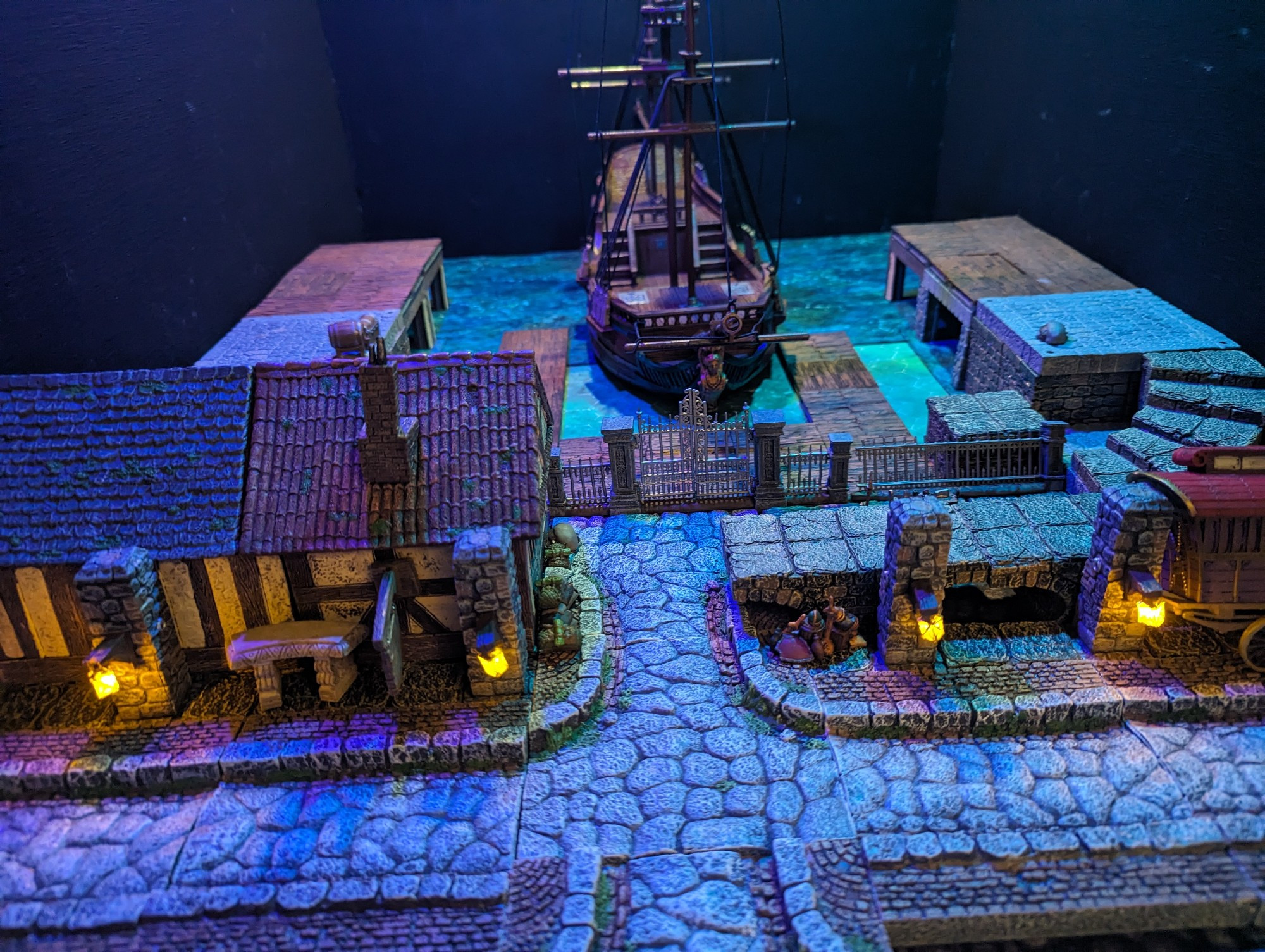 A tabletop miniature set depicting a dockside.