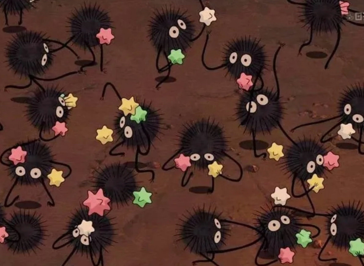 Some adorable black fuzzy Pompom creatures with googly eyes and long limbs are dancing about and gathering up their food which look like pastel star cake sprinkles