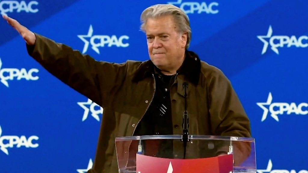 Steve Bannon doing the Nazi/Roman Salute.