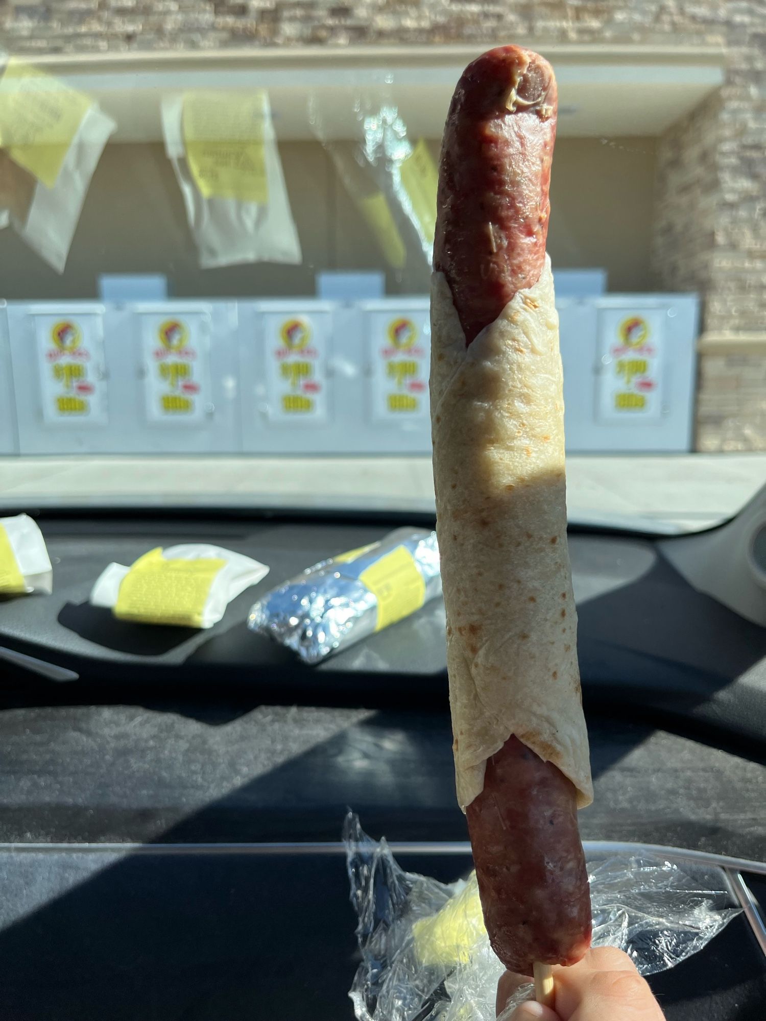 Tortilla wrapped sausage on a stick from Buc-ee’s. Yes, I ate all of it. And yes, it was delicious.