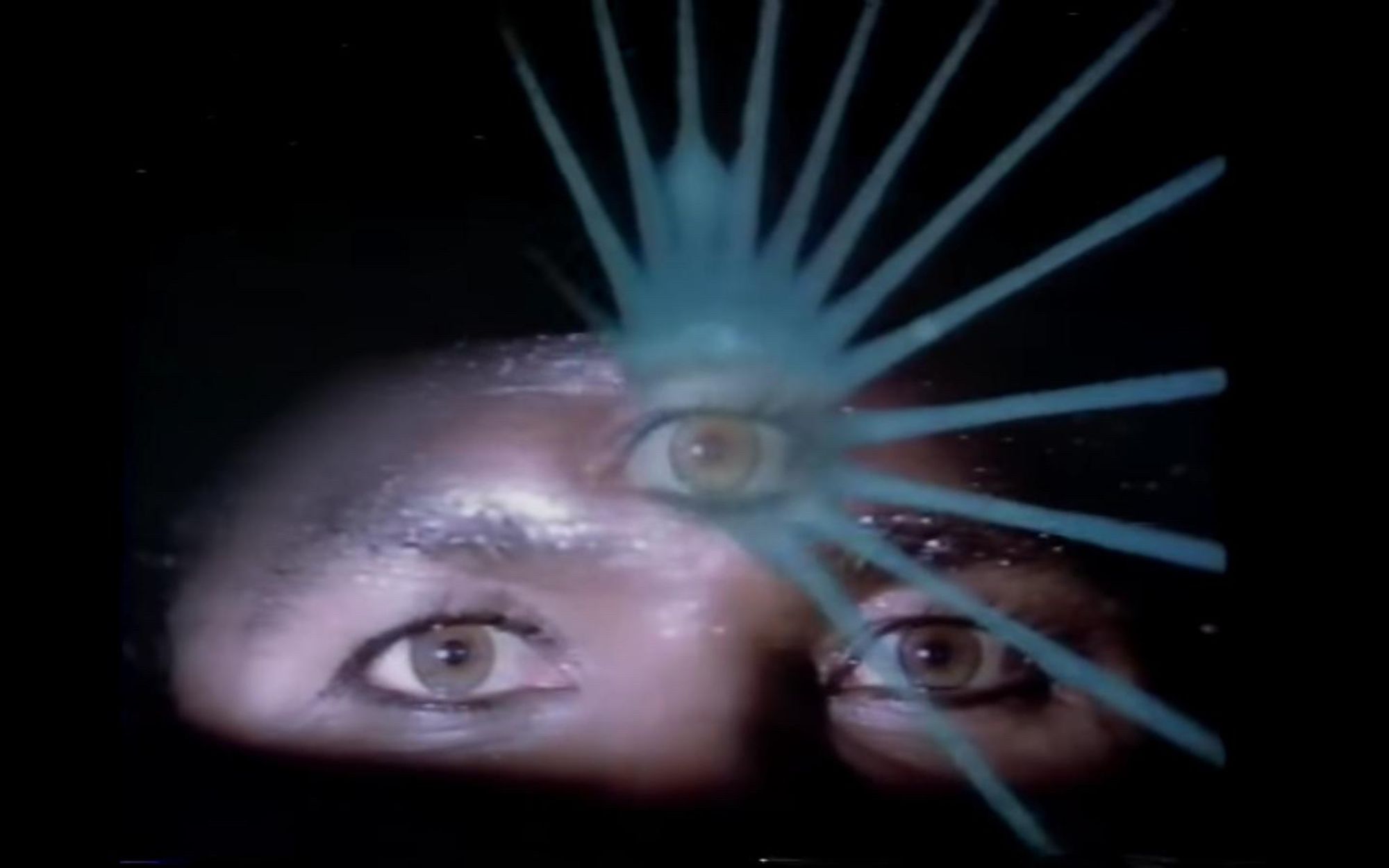 Screenshot from the insane afrofuturist music video for Philip Michael Thomas' single "Just The Way I Planned It" - the Third Eye of Tubbs