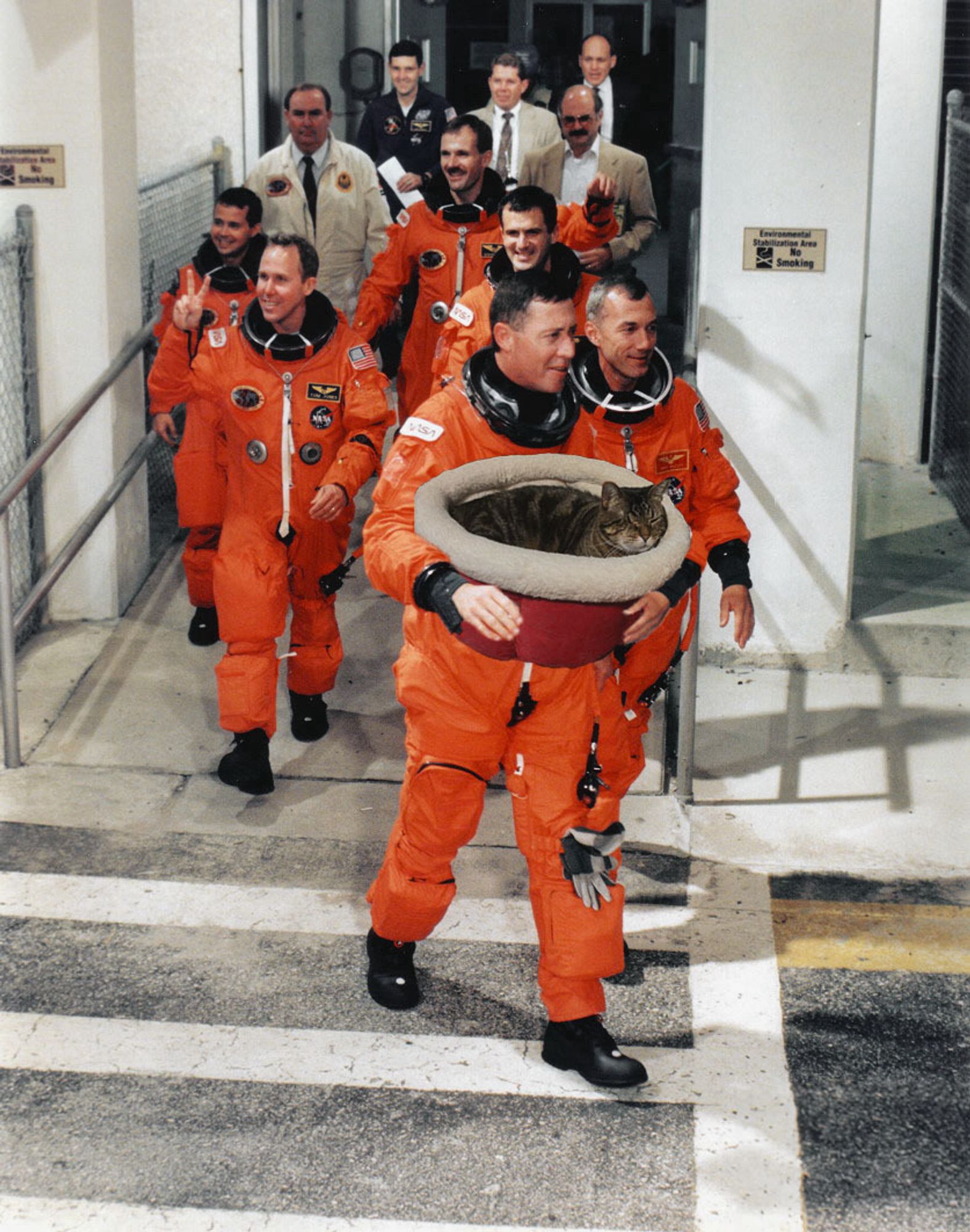 jackson being held in the arms of an astronaut