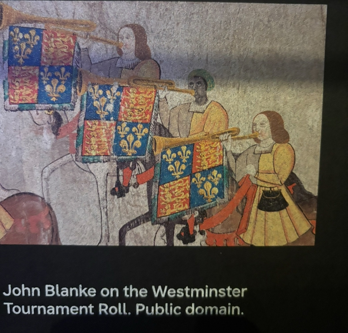 Image of 3 of Henry VIII’s trumpeters on horseback in full regalia from the Westminster Tournament Roll, John Blanke is the middle one