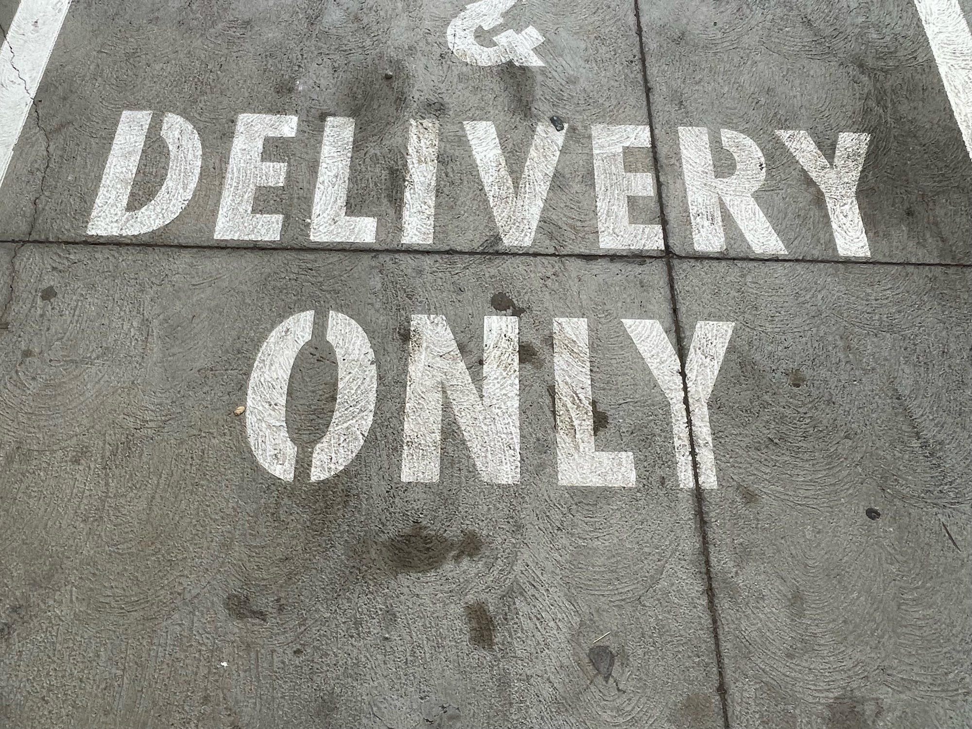 Painted parking says Delivery Only