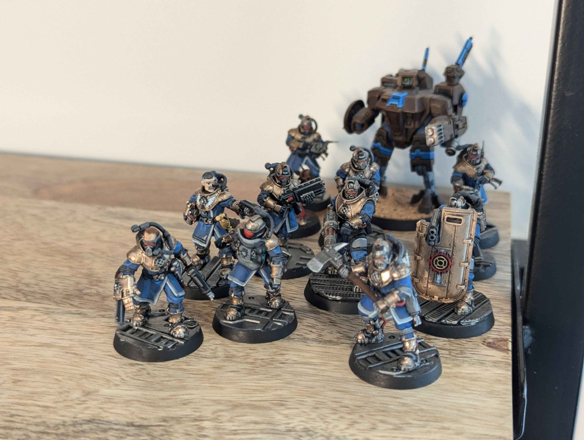 imperial navy breachers kill team, for the kill team miniatures wargame. there's a tau battlesuit in the background, for some reason. maybe it's an equipment choice?