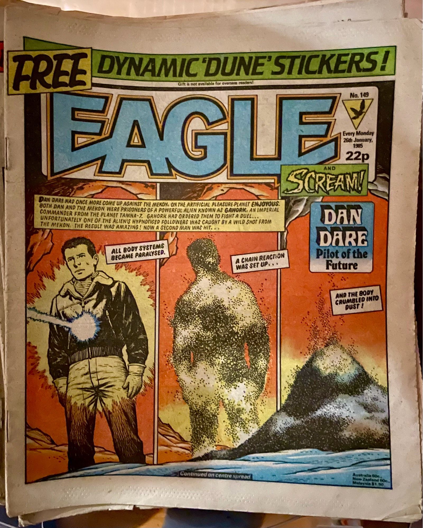 A vintage comic book cover titled "Eagle," featuring a story about Dan Dare, "Pilot of the Future." The cover depicts a dramatic scene with characters facing an alien threat, and includes vibrant colors and action-oriented text. The comic offers "FREE DYNAMIC ‘DUNE’ STICKERS!”