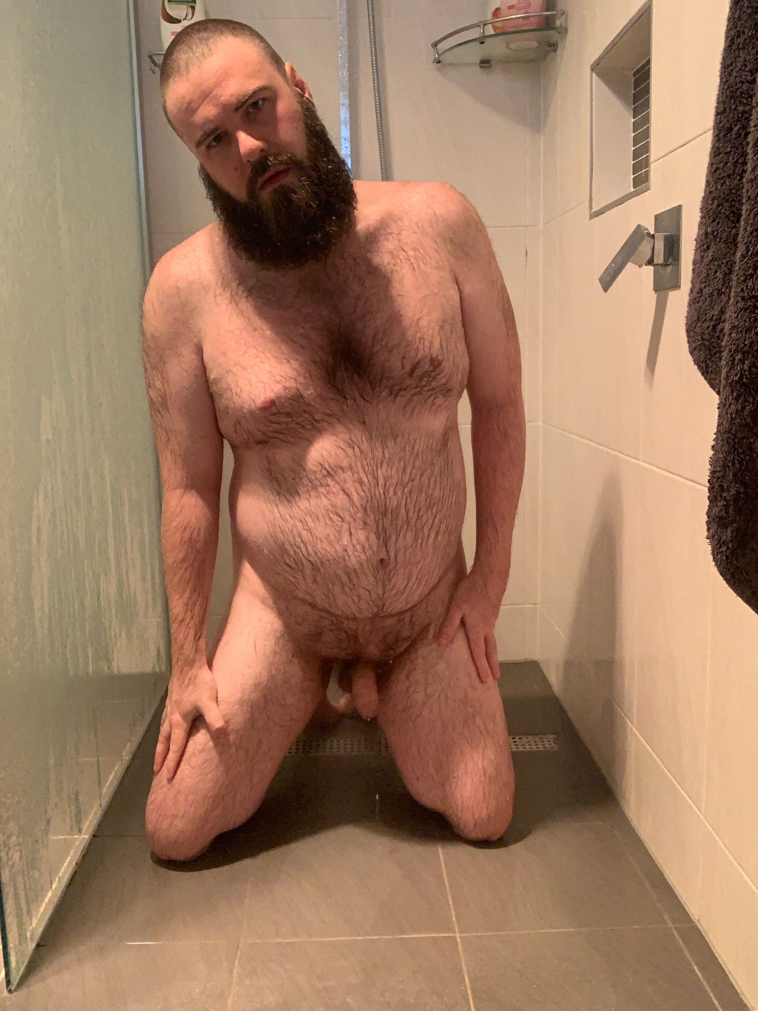 Me on my knees in the shower.