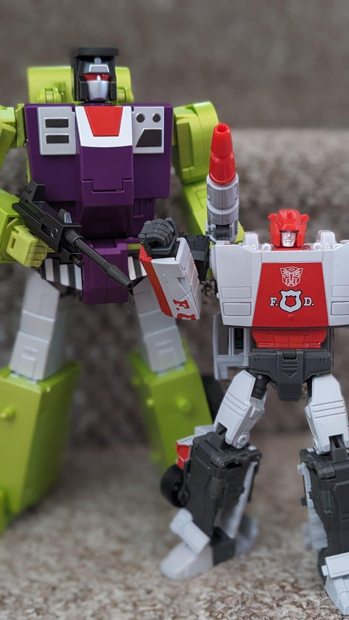 FansToys not Scrapper with Masterpiece Red Alert for size comparison