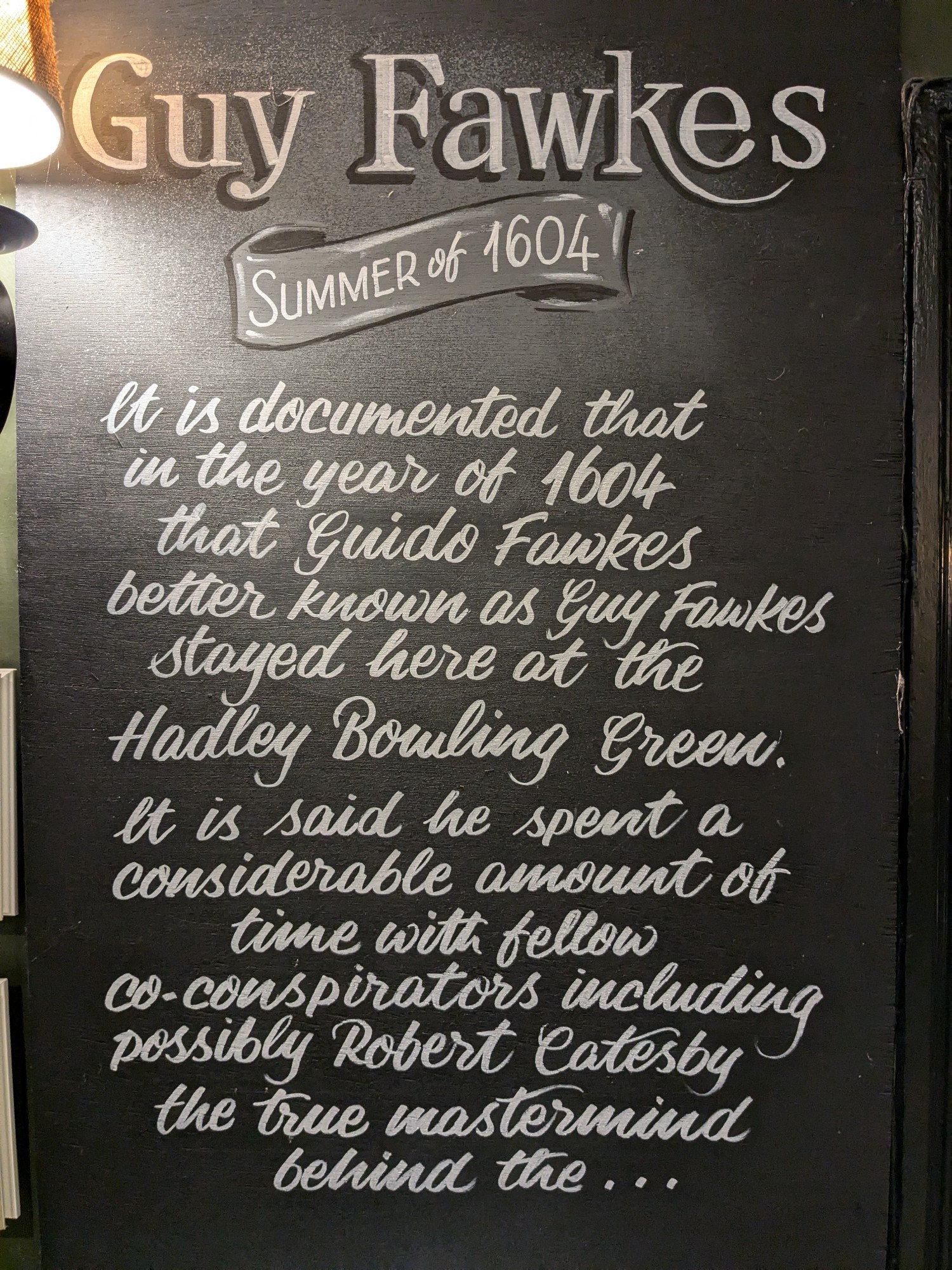 An information sign about Guido Fawkes and his alleged plotting in the pub in which the sign hangs.