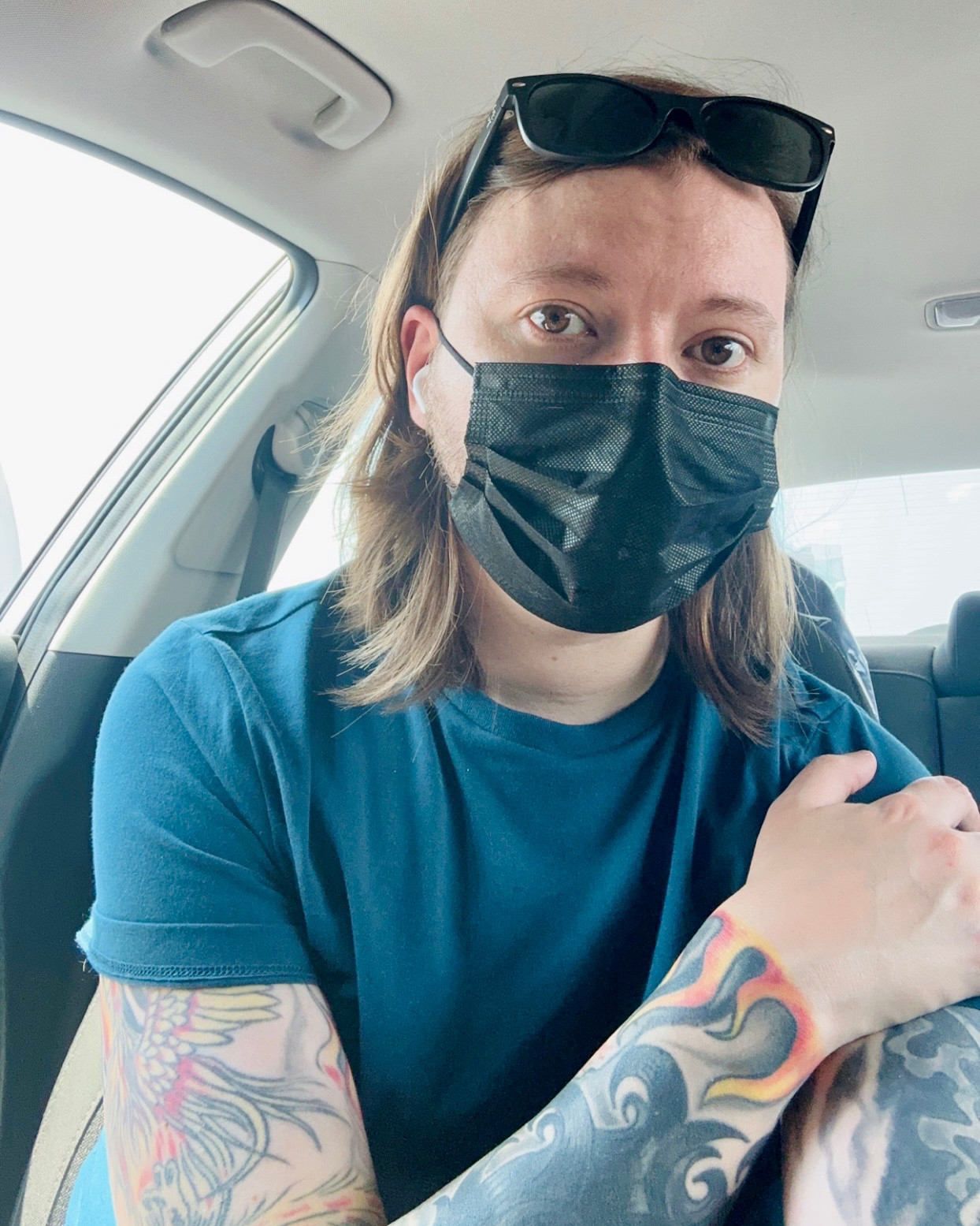 Selfie sitting in my car wearing a mask (about to go in the store)