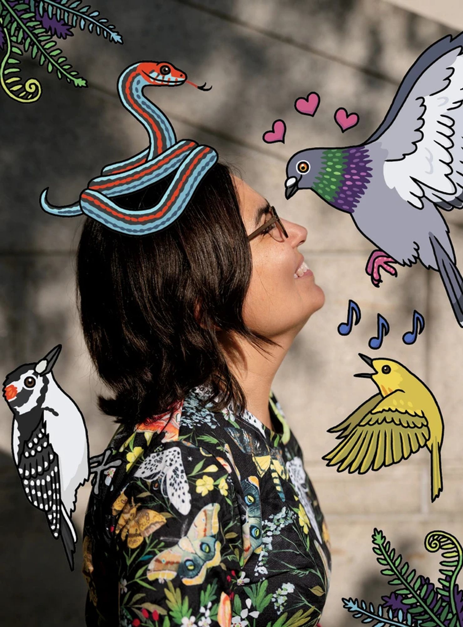 A woman standing in the sun, smiling, looking at a cartoon pigeon, with a cartoon snake on her head, surrounded by birds and ferns.