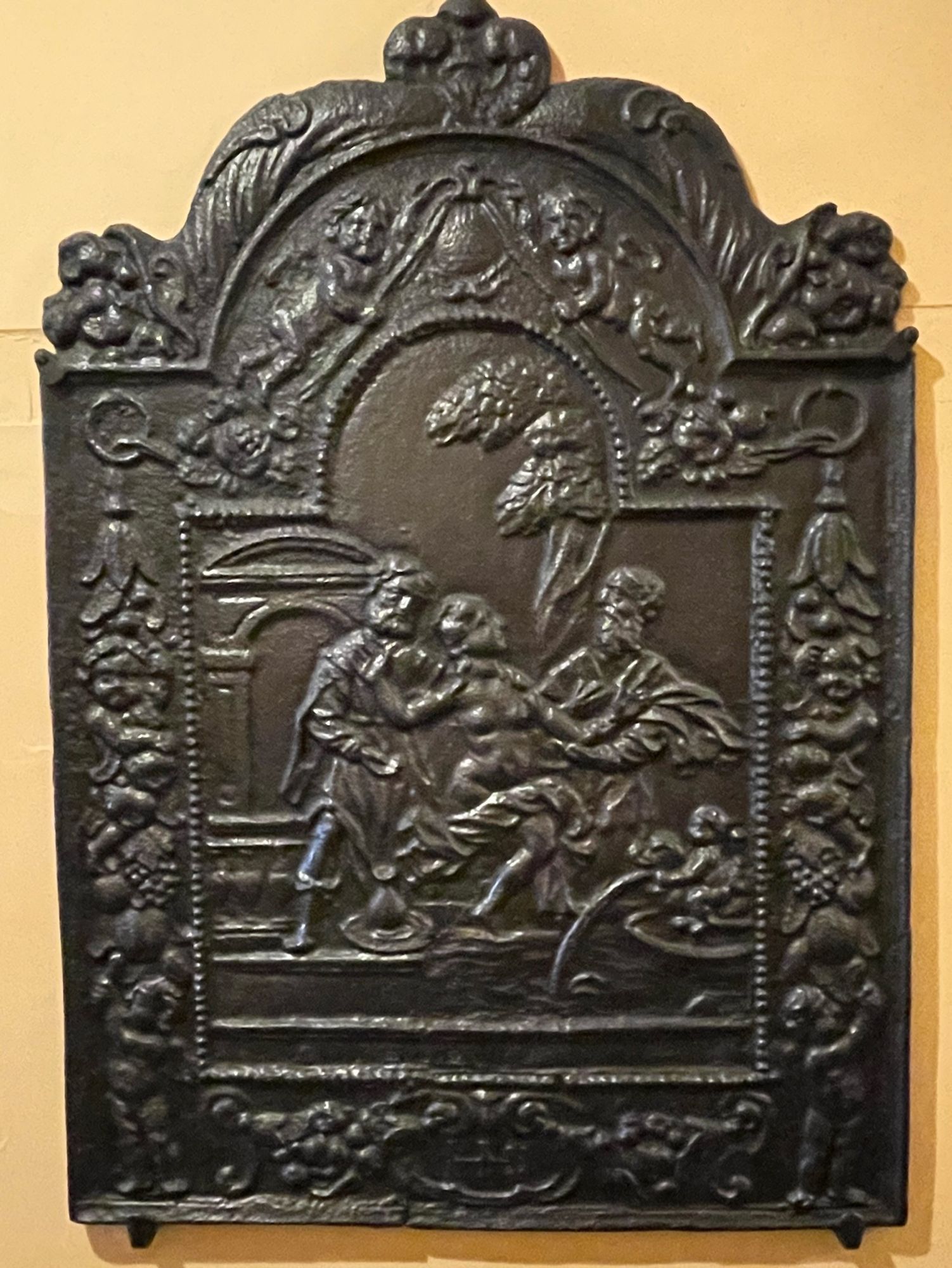 Mid-late fireback, made in Germany for the Dutch market, showing a scene of Susanna and the Elders.