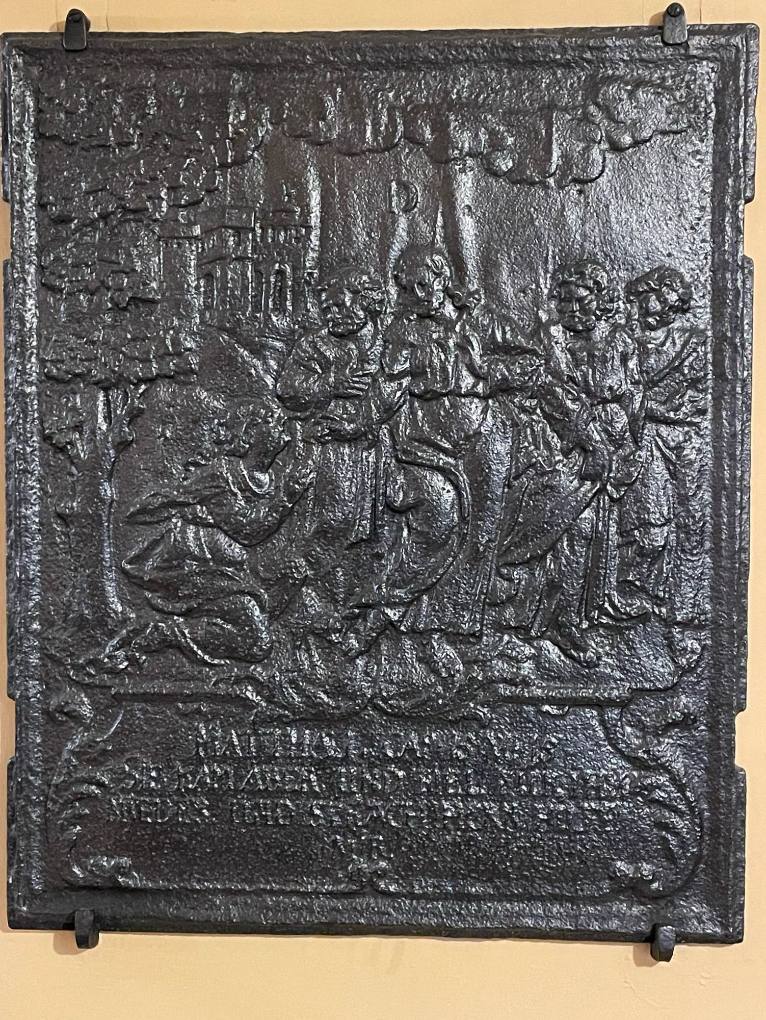 Side plate from a 17th-century stove made in Germany, with a scene from the Gospel of St Matthew.