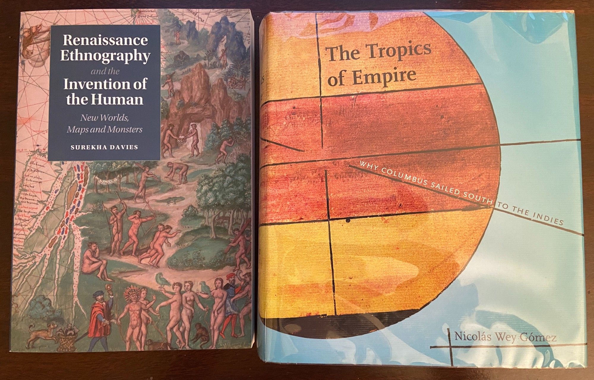 Photo of 2 books: Renaissance Ethnography and the Invention of the Human, by Surekha Davies; and The Tropics of Empire, by Nicolas Wey Gómez.