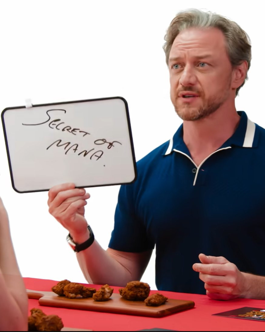 actor James McAvoy holding his trademark whiteboard with "Secret of Mana" written on it