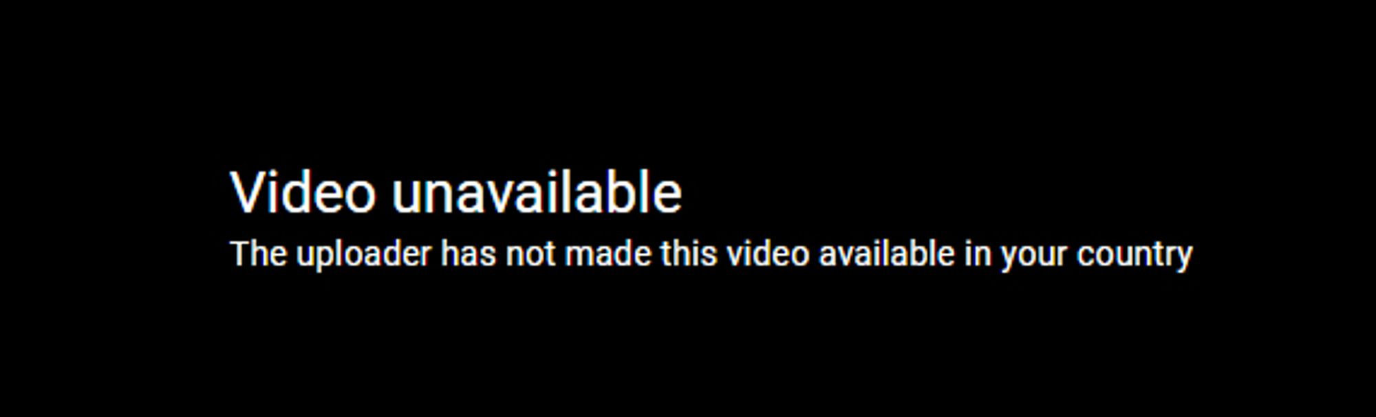 A black screen with white text reading "Video unavailable. The uploader has not made this video available in your country"