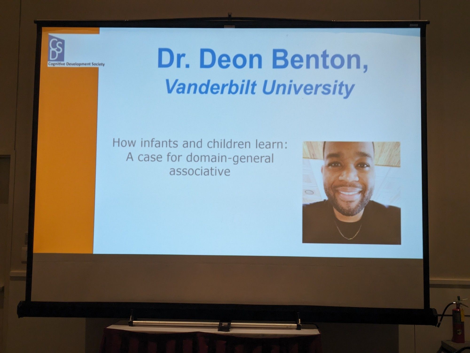 Slide reading "Dr. Deon Benton, Vanderbilt University

How infants and children learn:

A case for domain-general associative" and a picture of Dr Benton