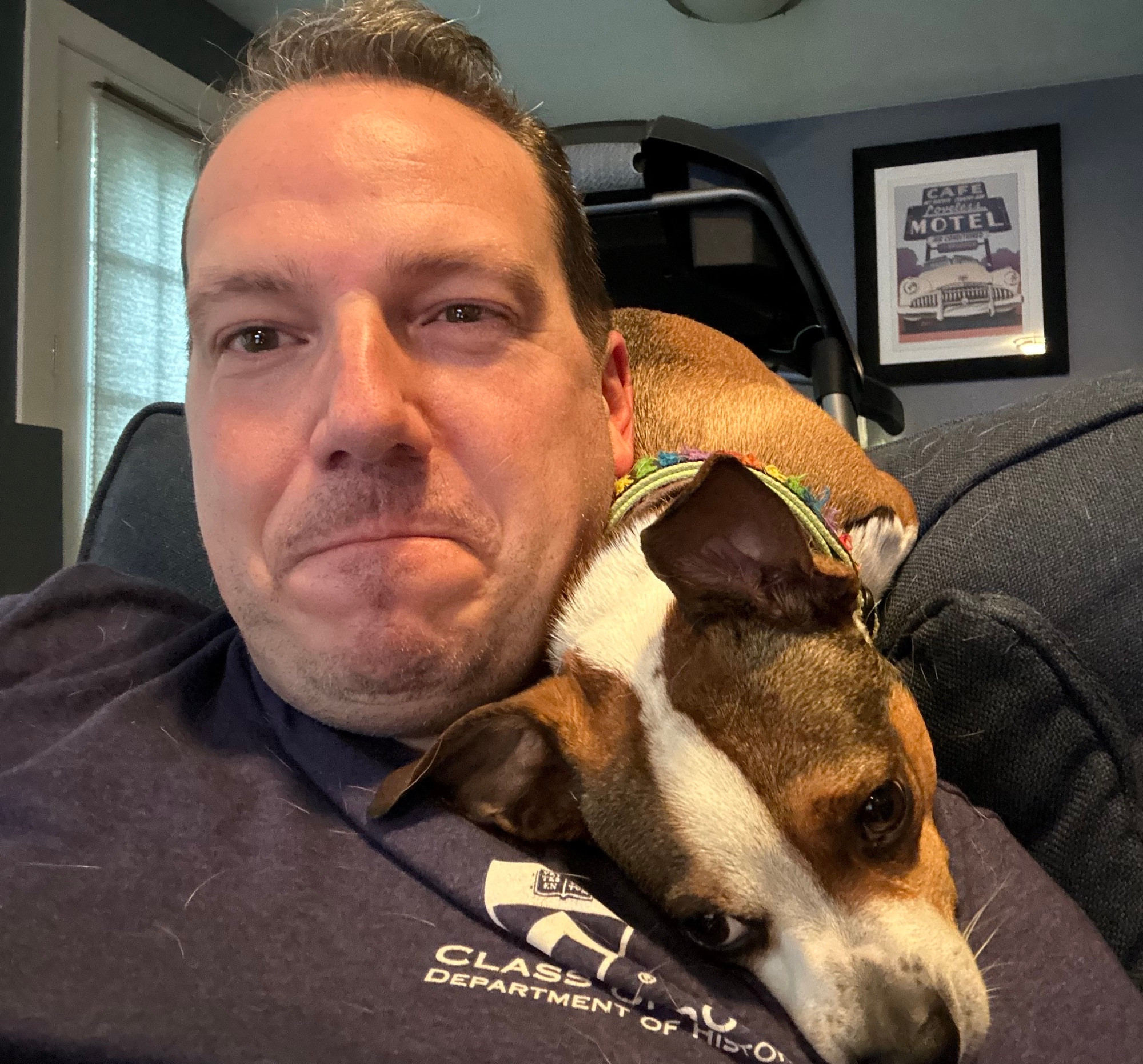 Sarge curled behind my head with his head on my chest 
