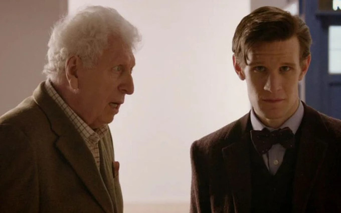 A scene from the Doctor Who 50th Anniversary Special, "The Day of the Doctor", featuring the Fourth Doctor (Tom Baker) talking to the Twelfth Doctor (Matt Smith).