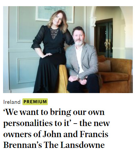 A clip from the Irish Independent newspaper showing a photo of a random man and woman sitting on a couch in a plush room, with the following headline written underneath: "We want to bring our own personalities to it - The new owners of John and Francis Brennan's The Lansdowne."