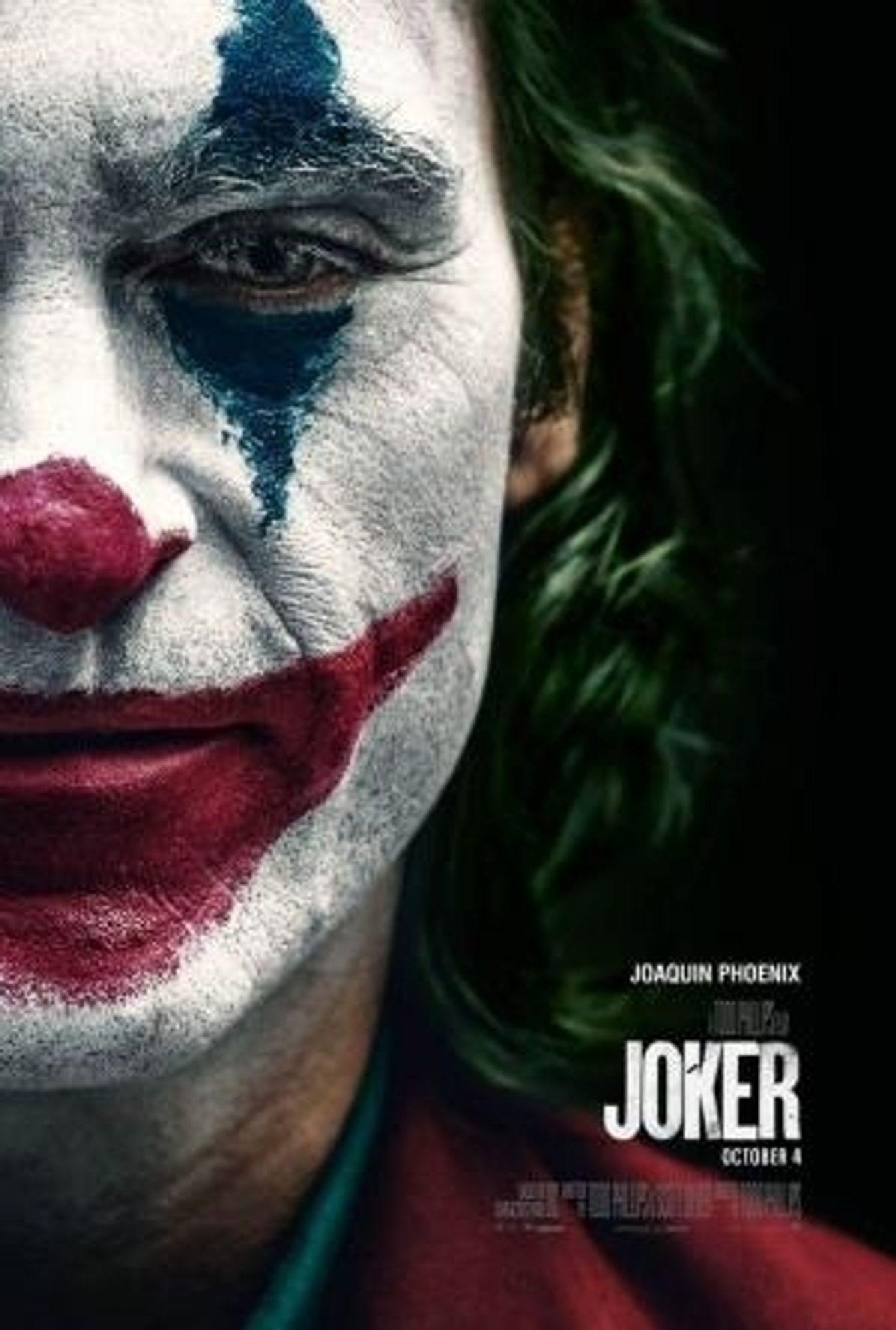 Cartel de la peli Joker. Se ve media cara del protagonista.