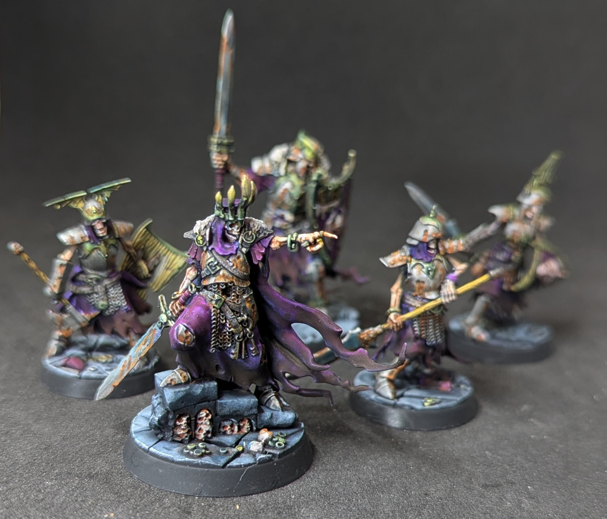 A photo of the Sons of Velmorn miniature figures from Games Workshop's Age of Sigmar range. 5 skeletons armed with various weapons.