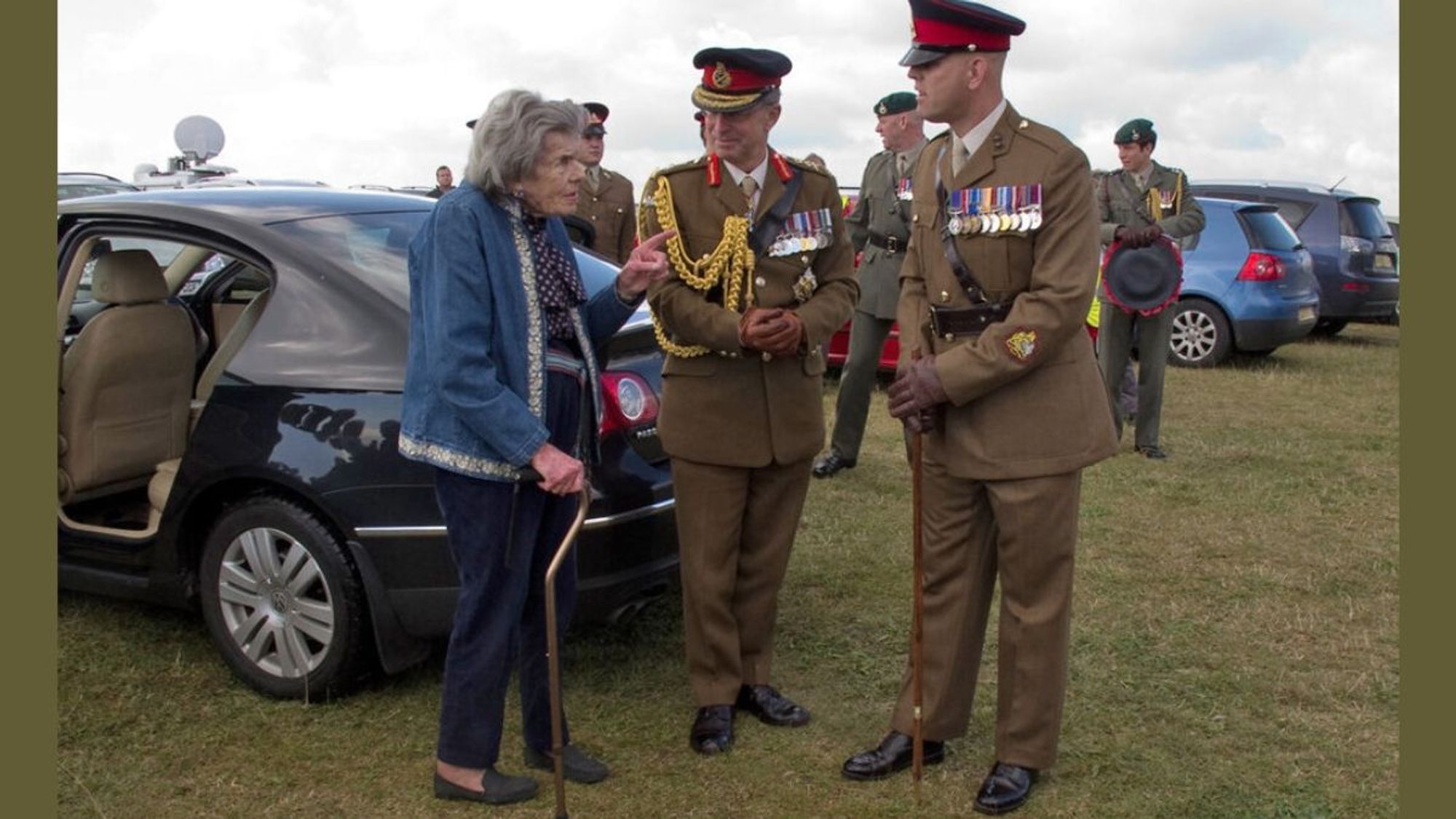 Countess Mountbatten arrives at the memorial and is greeted by General Sir David Richards and an NCO.