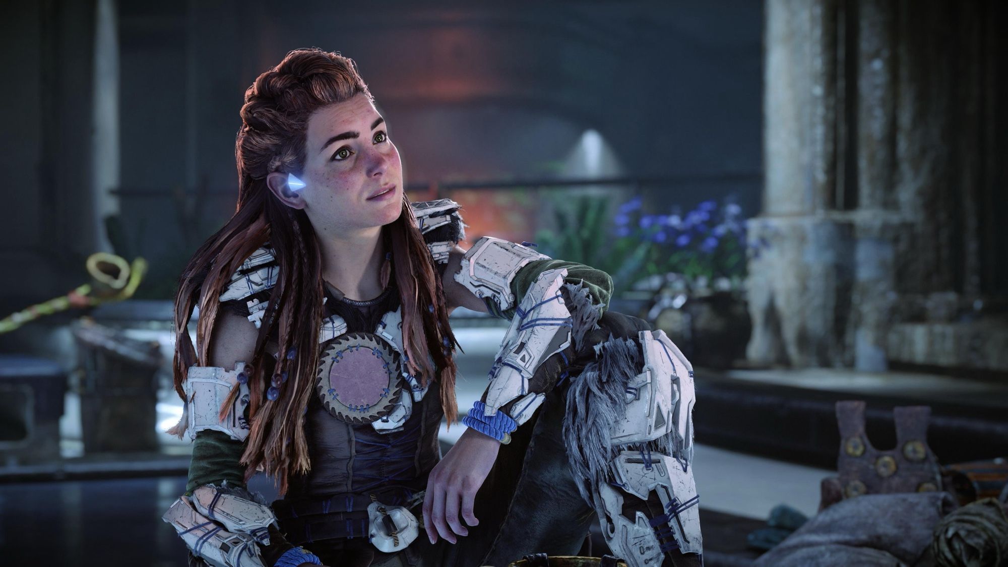 Aloy, the main protagonist, in thoughtful reflection.