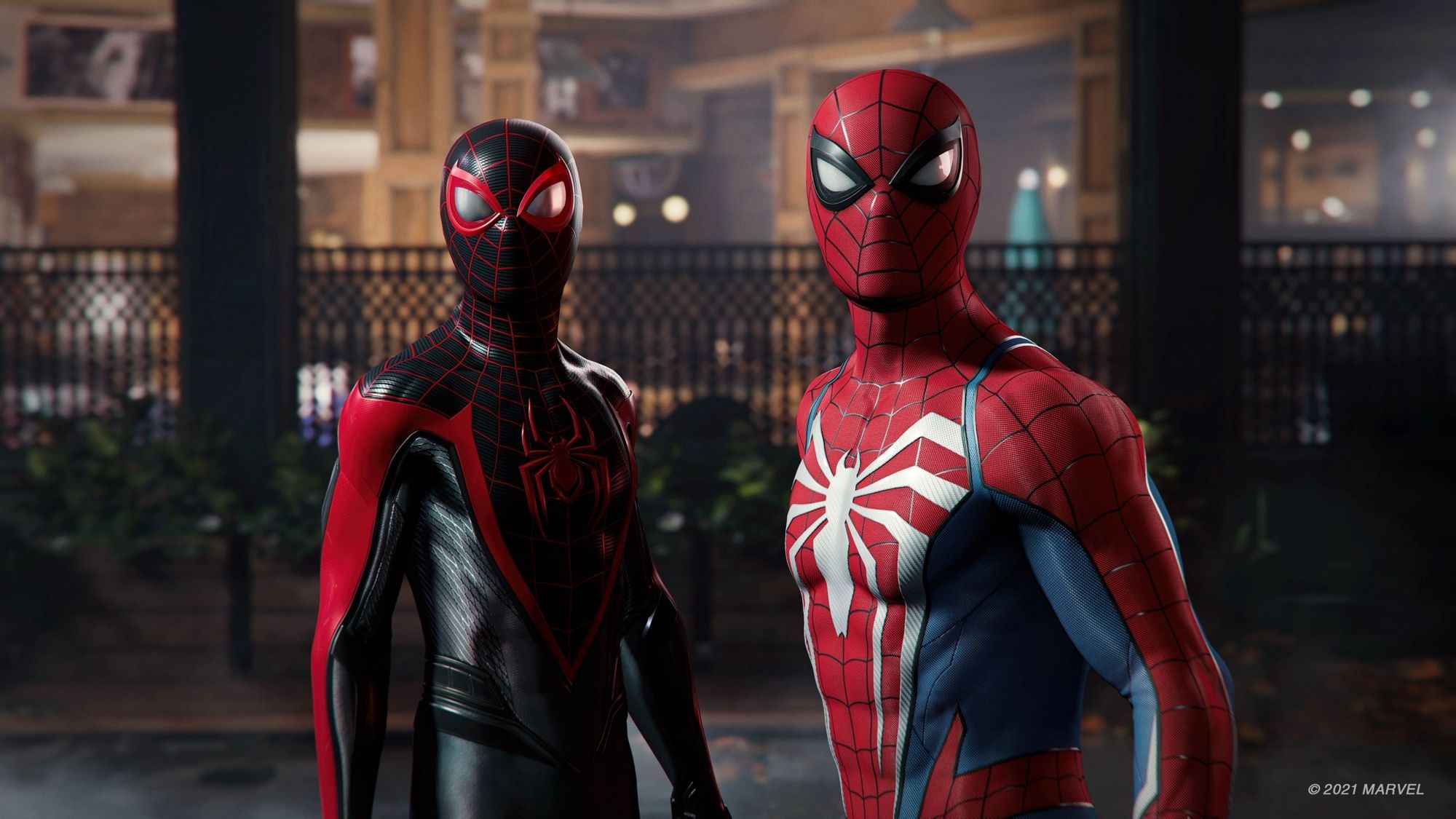 Dual protagonists, Miles Morales (left) and Peter Parker (right), as Spider-Man. Both are looking in the direction of the camera.